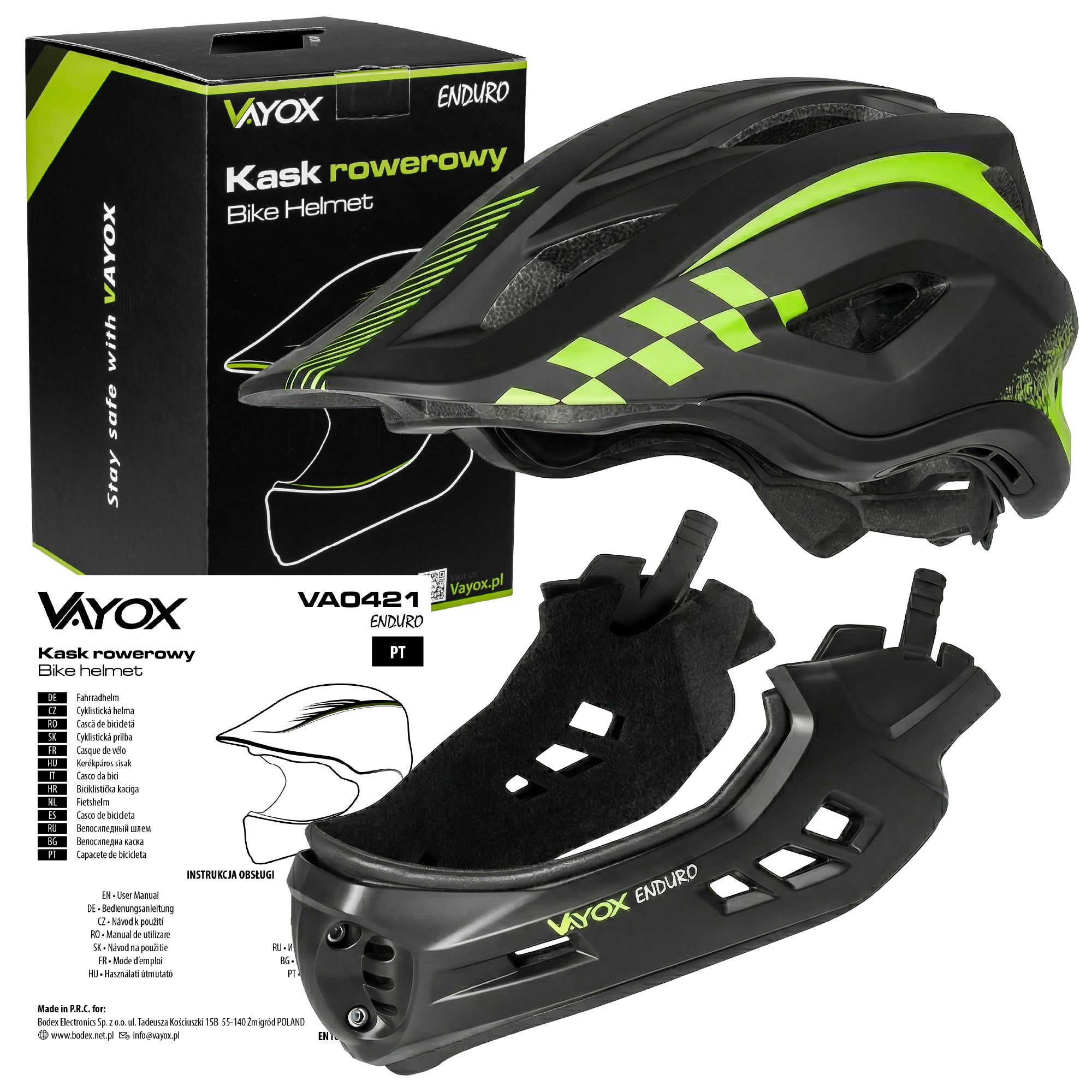 Czarny kask rowerowy Vayox Enduro z zielonymi akcentami i akcesoriami.