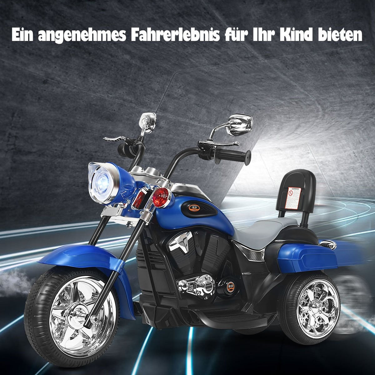 A blue three-wheeled child's motorcycle with chrome wheels and a headlight.