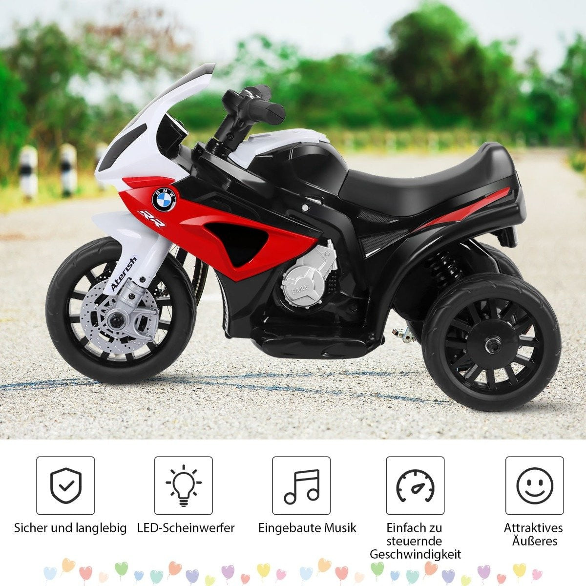 A black, red, and white three-wheeled toy motorcycle on a road.