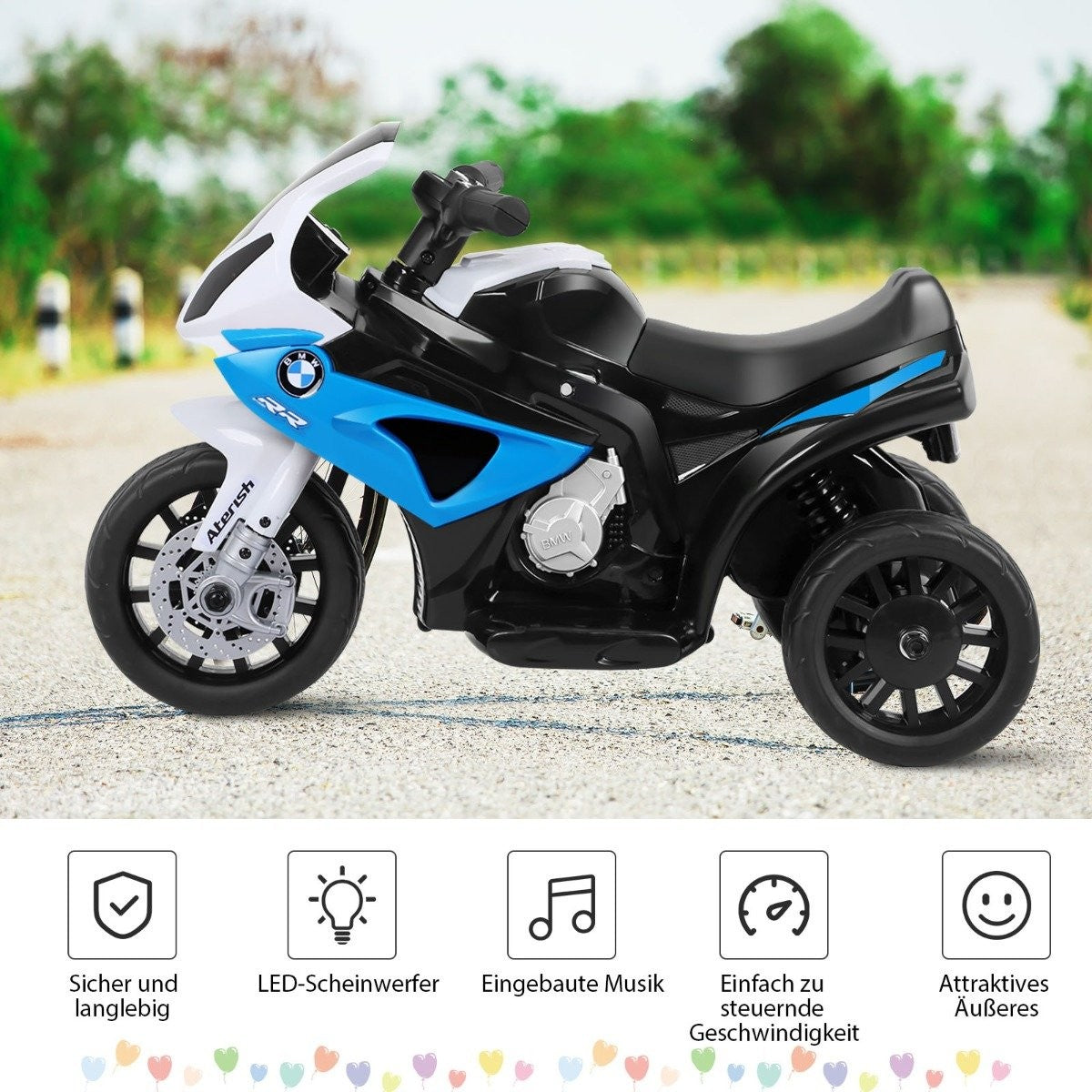 Una motocicleta infantil BMW azul y blanca de tres ruedas está en una carretera.