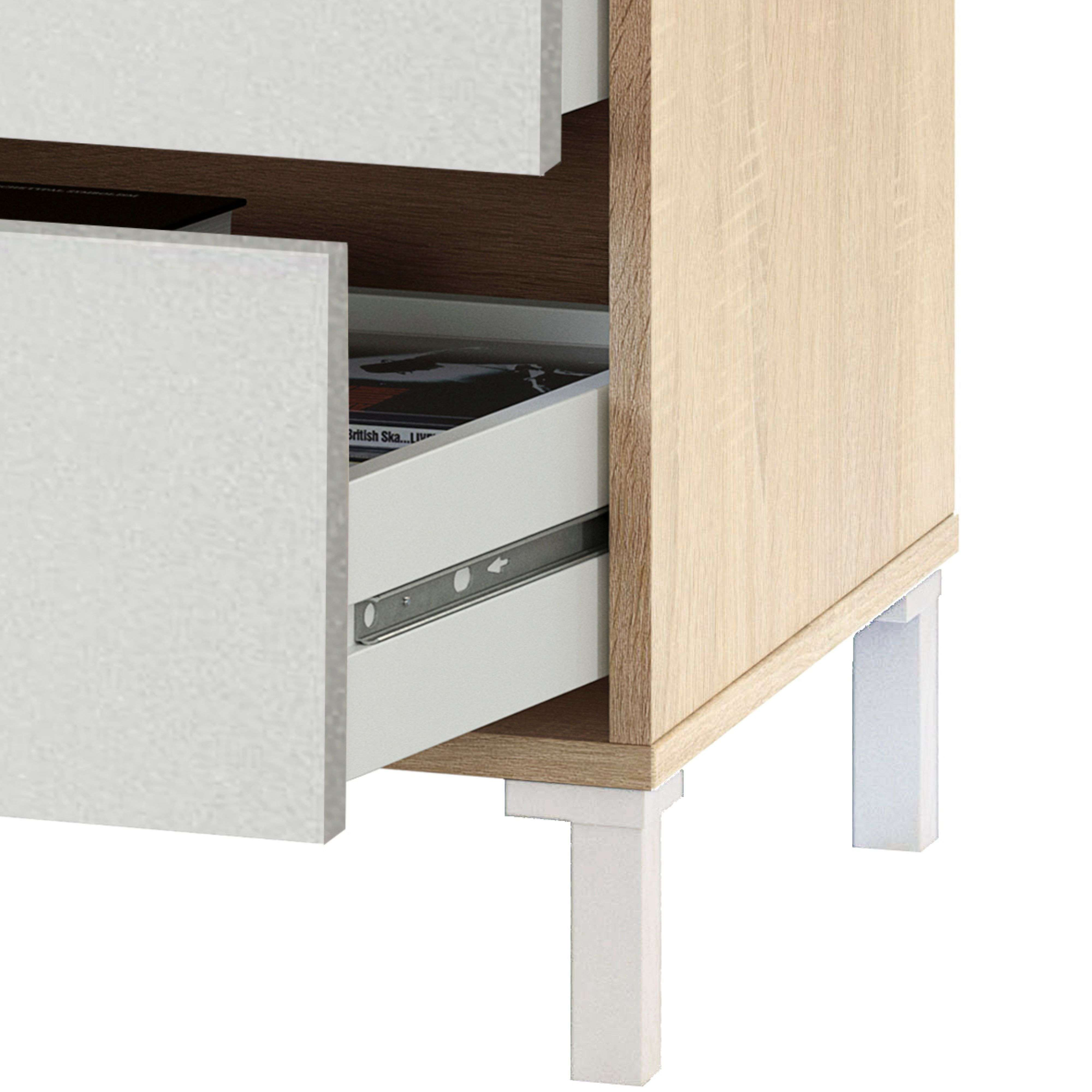 Un cajón blanco de mueble de madera con patas blancas está abierto.