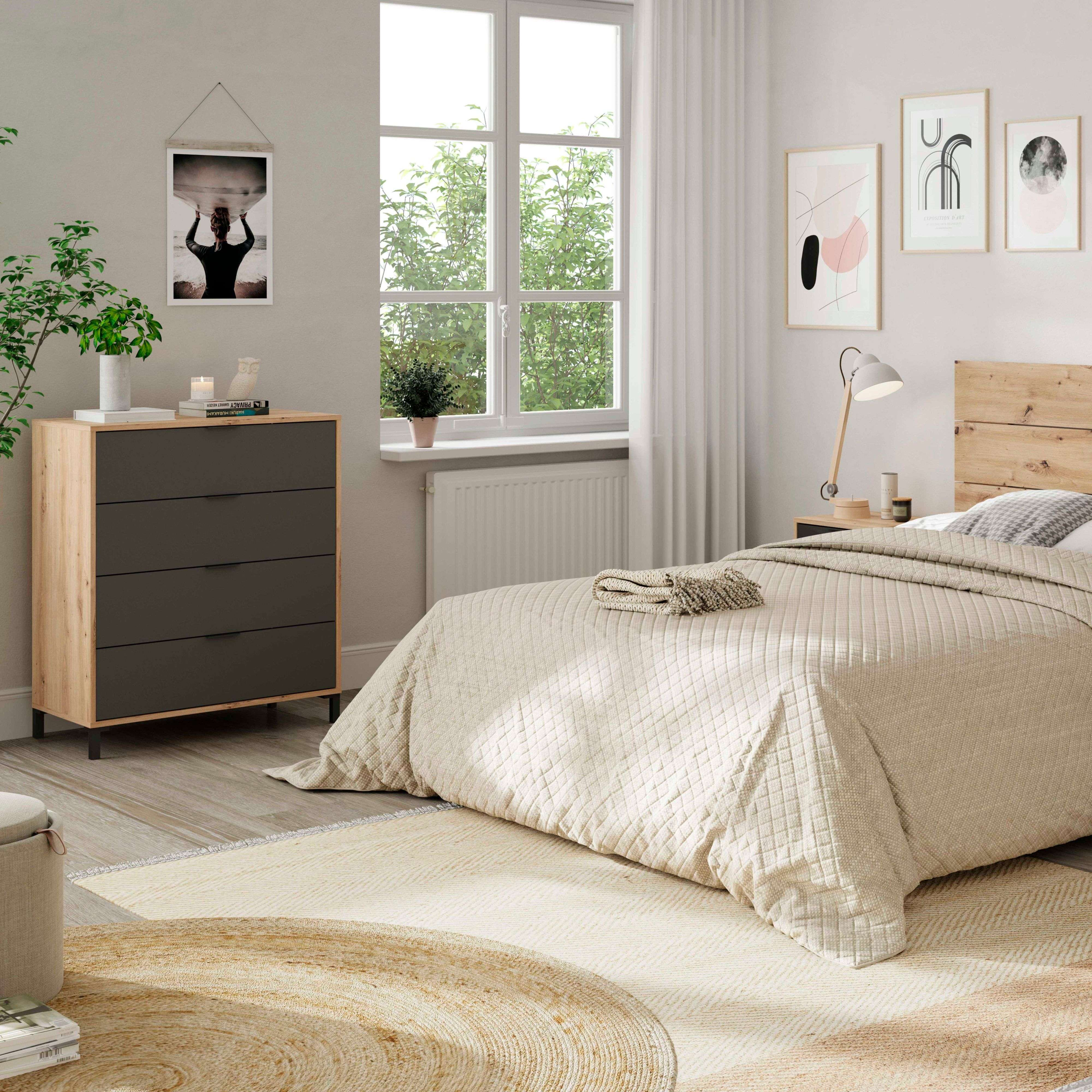 Un dormitorio con cama, cómoda, ventana y arte en la pared.