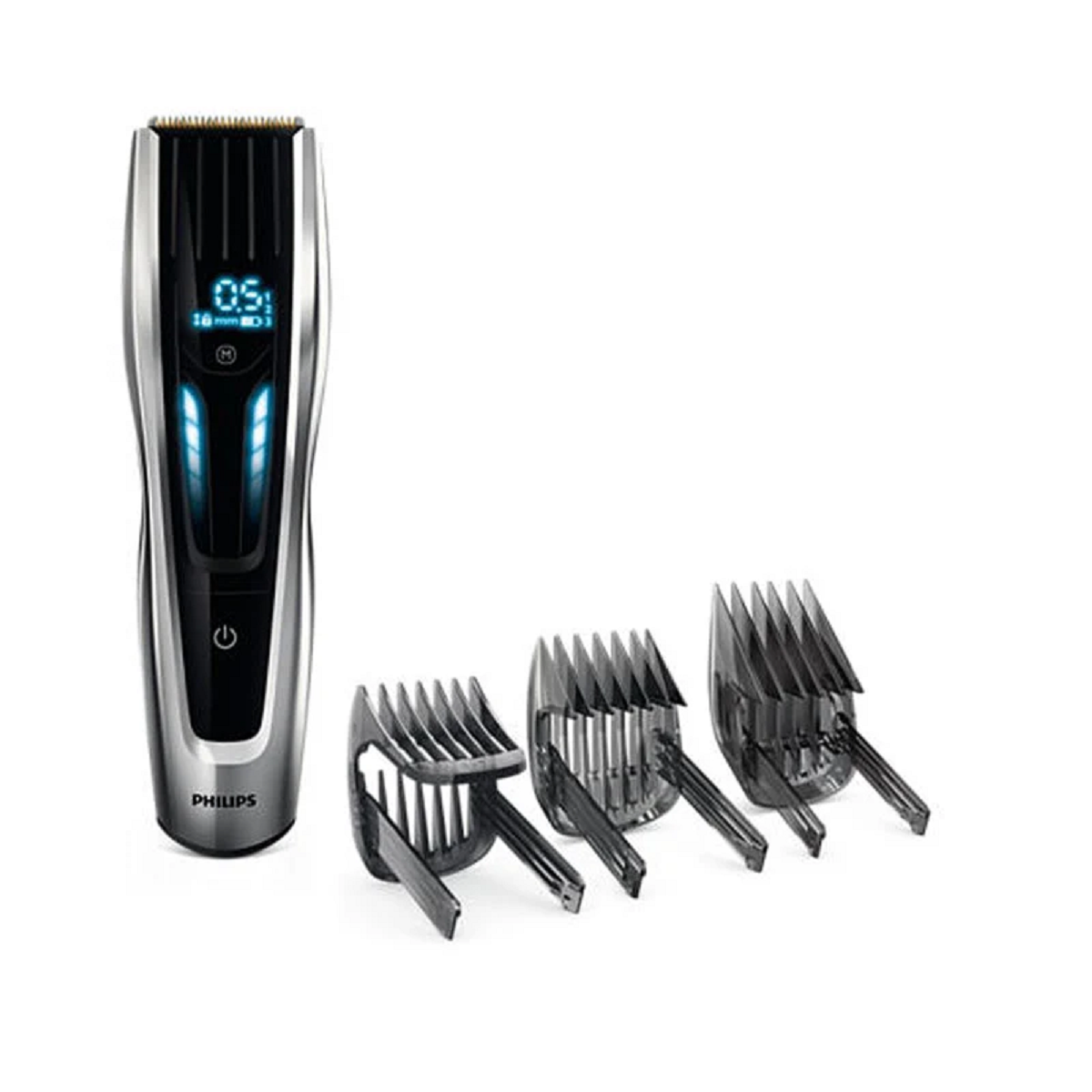 Een zilverkleurige en zwarte Philips tondeuse met digitaal display en drie opzetstukken.