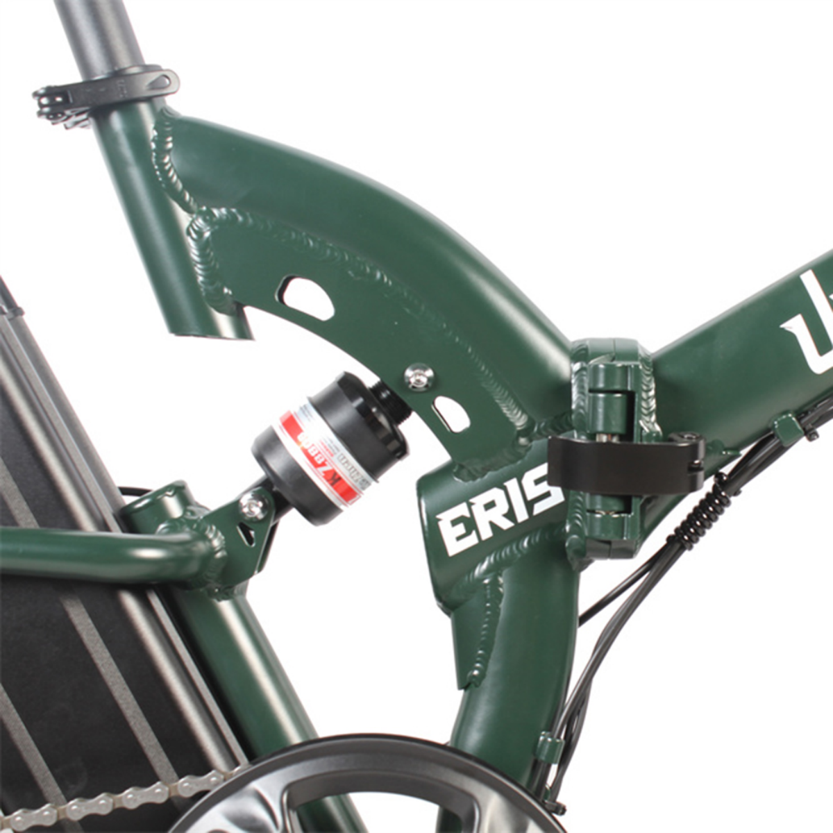 Zielony rower z amortyzatorem i łańcuchem.