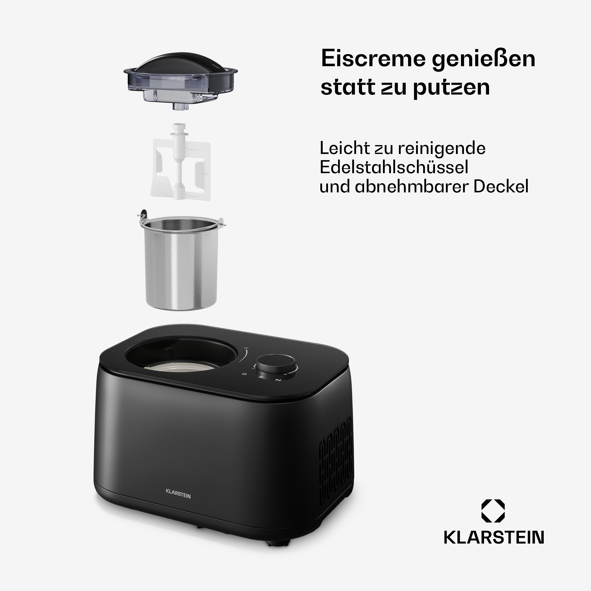 Schwarze Eismaschine mit zerlegten Teilen: Deckel, Paddel und Edelstahlschüssel.