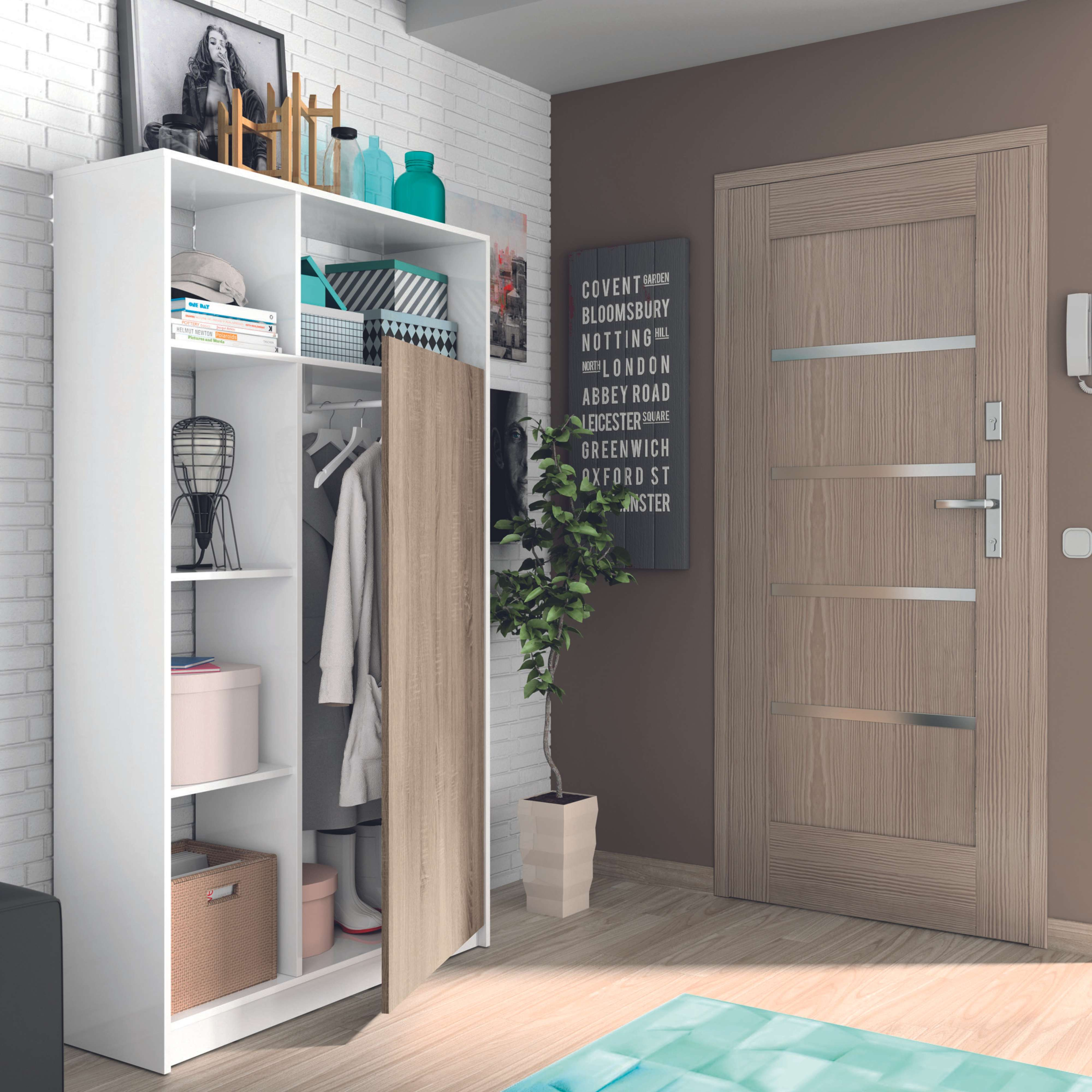 Pasillo con perchero, puerta y plantas. Pared de ladrillos blancos y suelo de madera.
