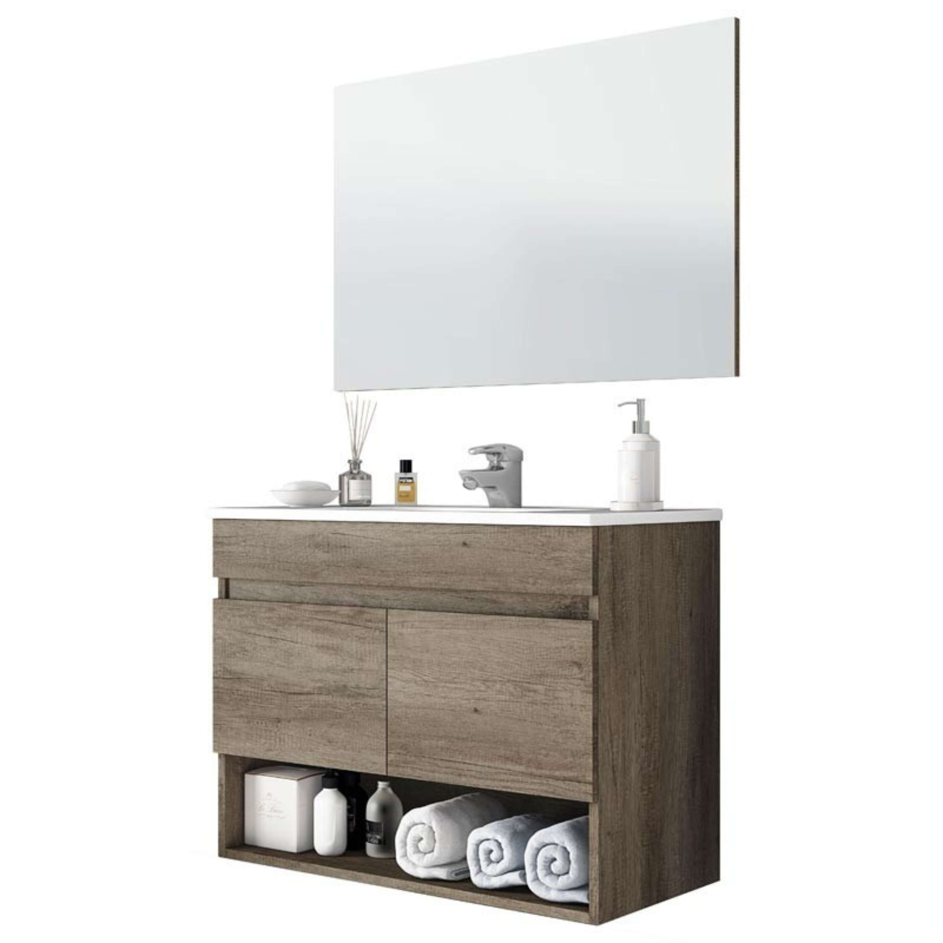 Un tocador de madera con espejo, dispensador, jabón, toallas y decoración.