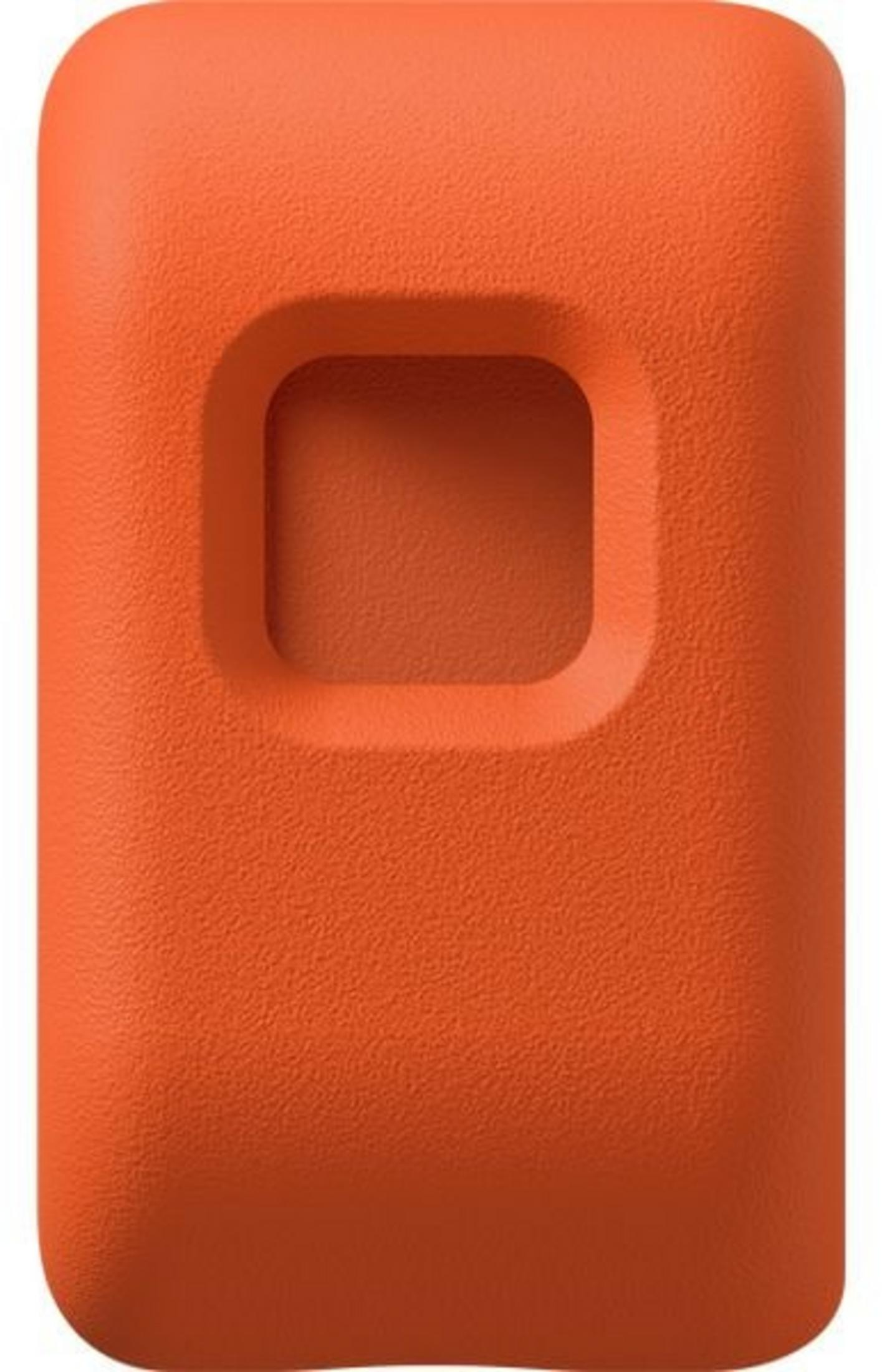 Pomarańczowy, prostokątny przedmiot z kwadratowym wgłębieniem pośrodku.