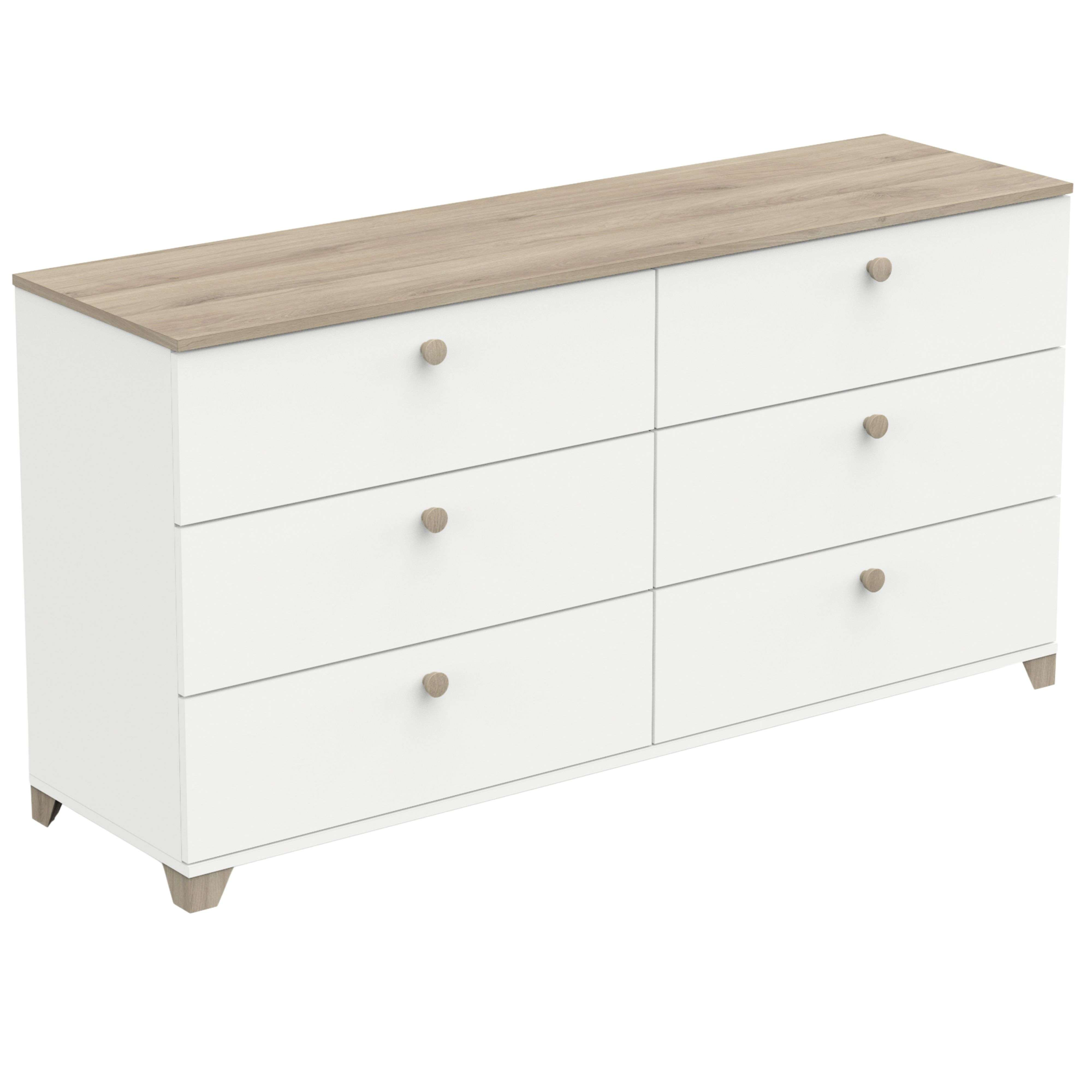 Cómoda blanca con tapa de madera y tiradores redondos.