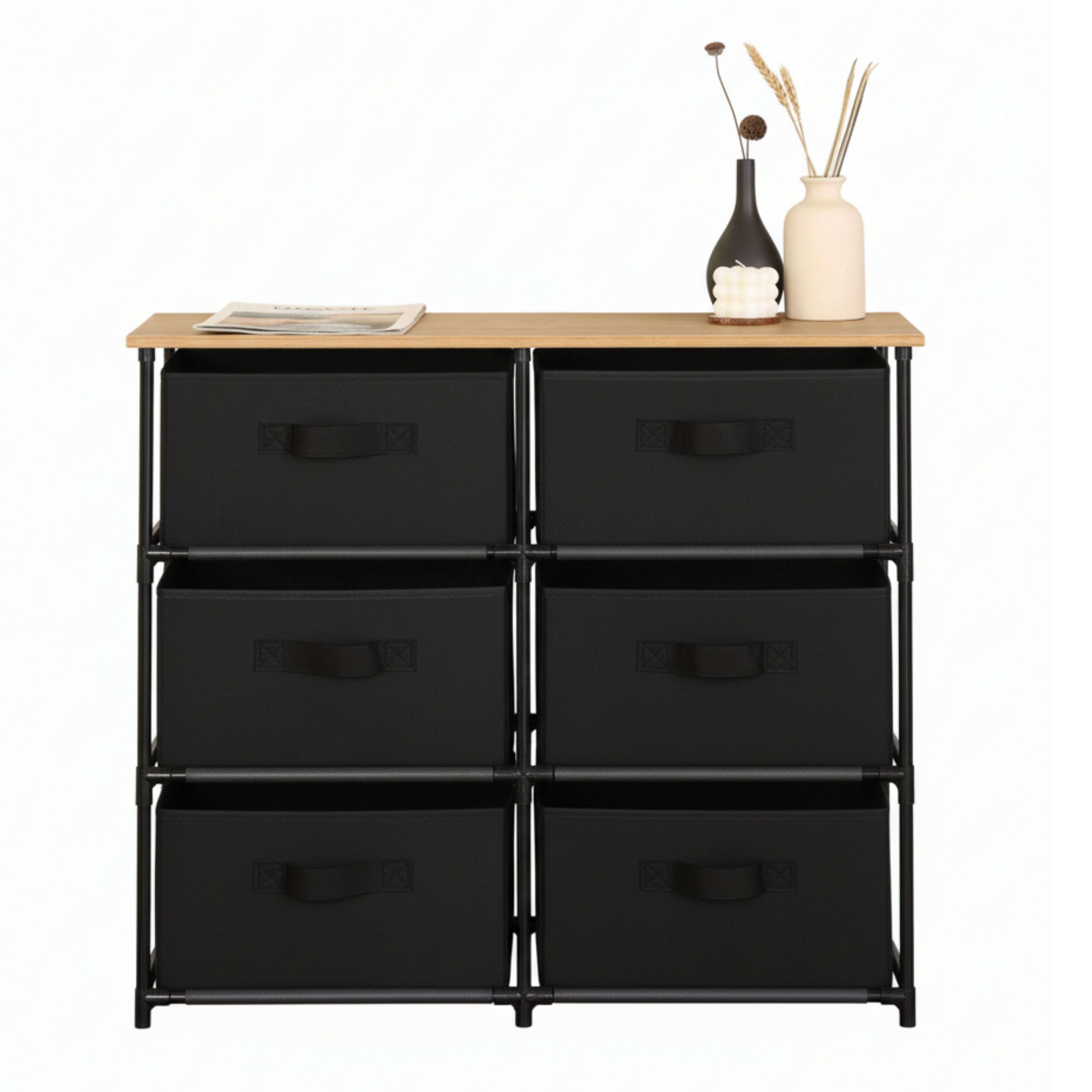 Un mueble de madera con seis cajones de tela negros y objetos decorativos.