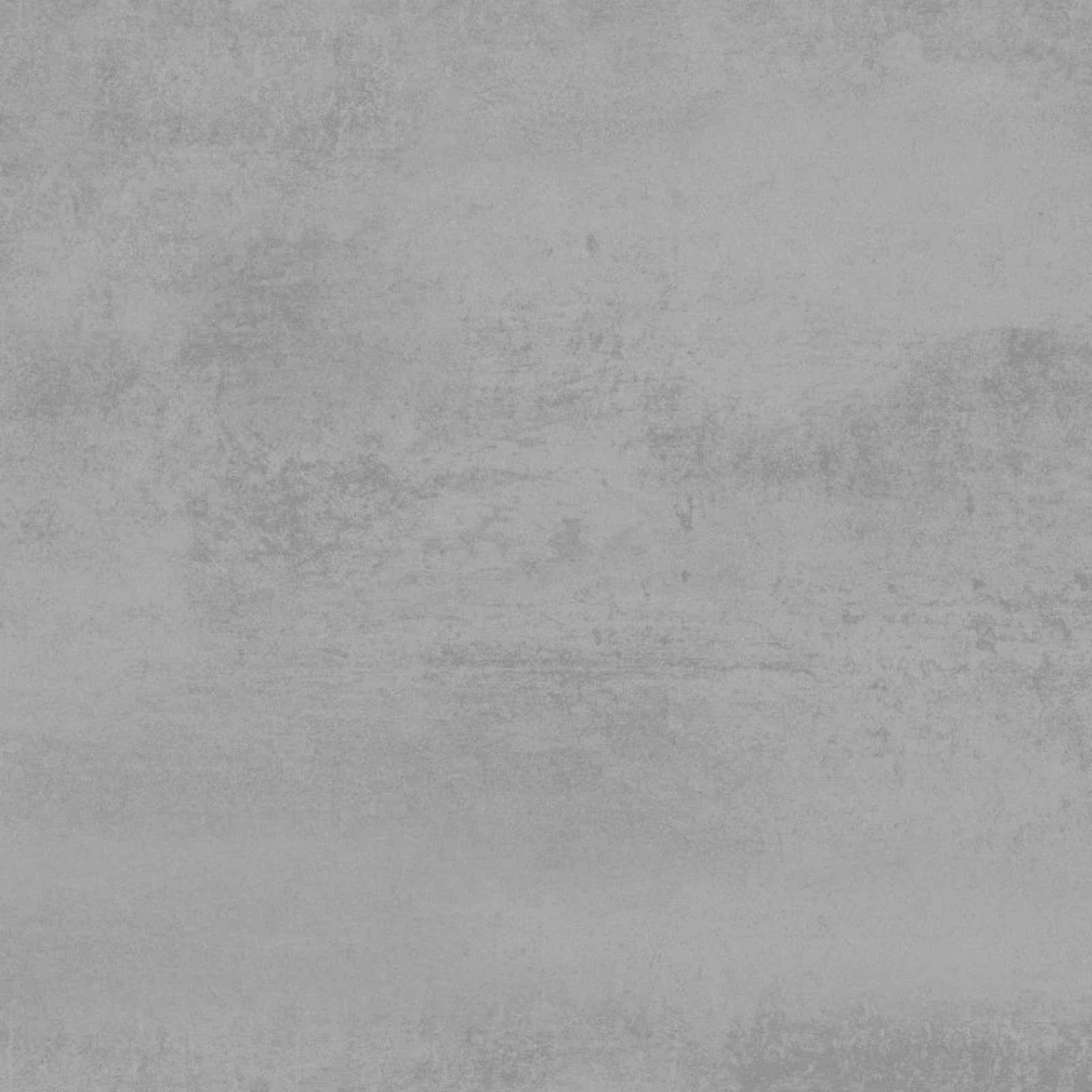 Una textura de hormigón gris con sutiles variaciones de color y superficie rugosa.