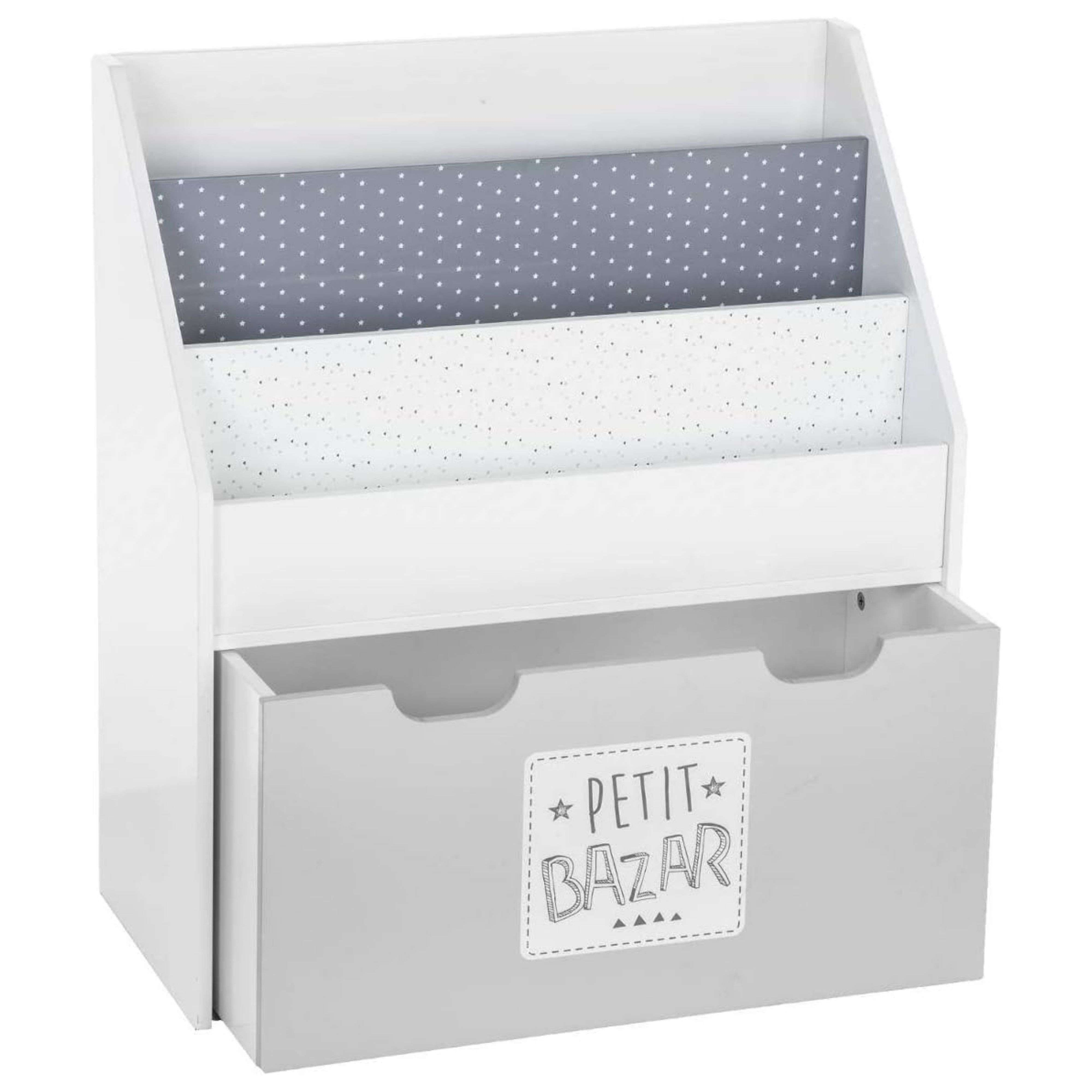Un estante blanco con estampado de estrellas y un cajón. Etiquetado 'Petit Bazar'.