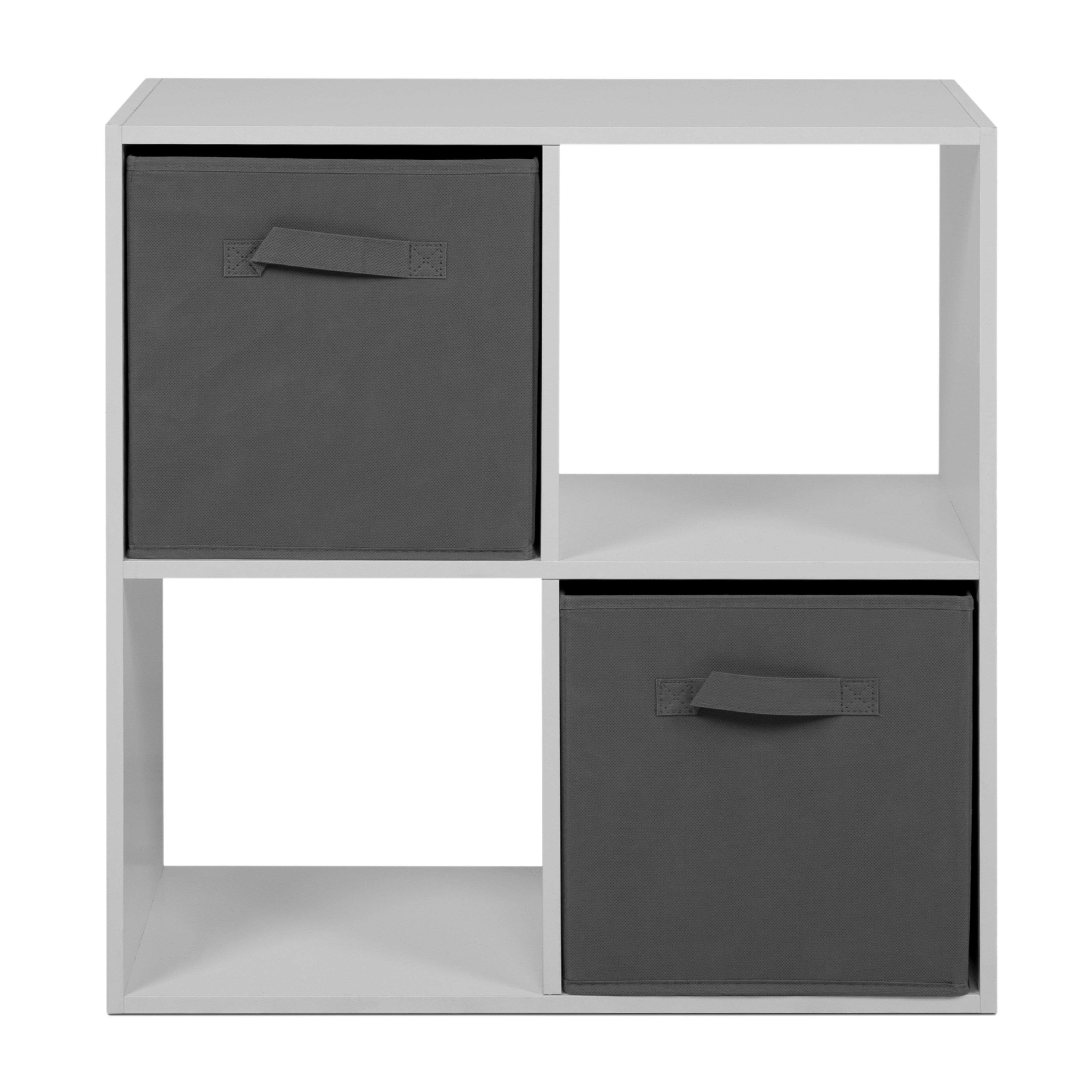 Un mueble blanco con dos cajas de tela gris oscuro.