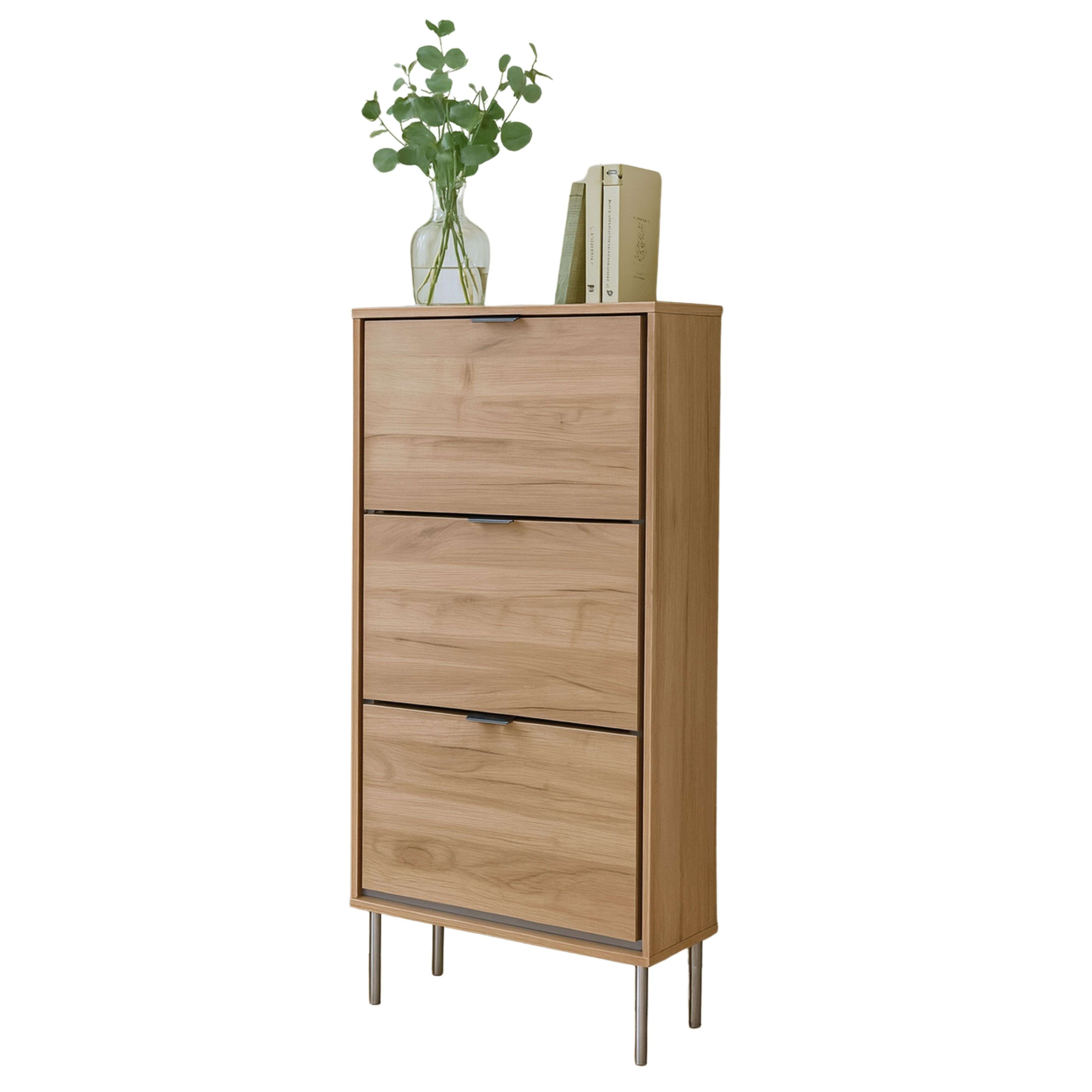 Un mueble estrecho de madera con tres cajones y patas plateadas.