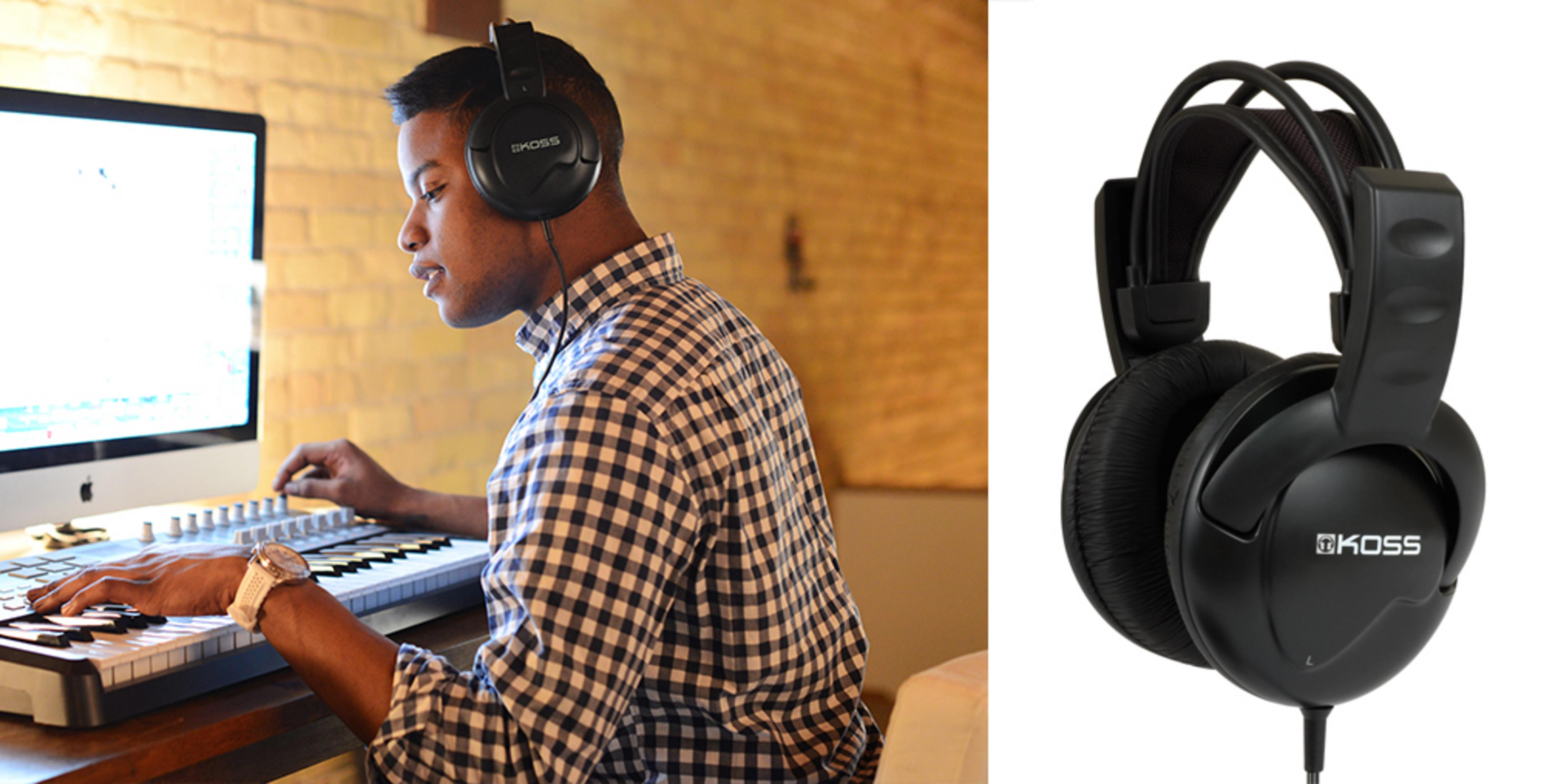 Homme portant un casque utilise un clavier devant un ordinateur.