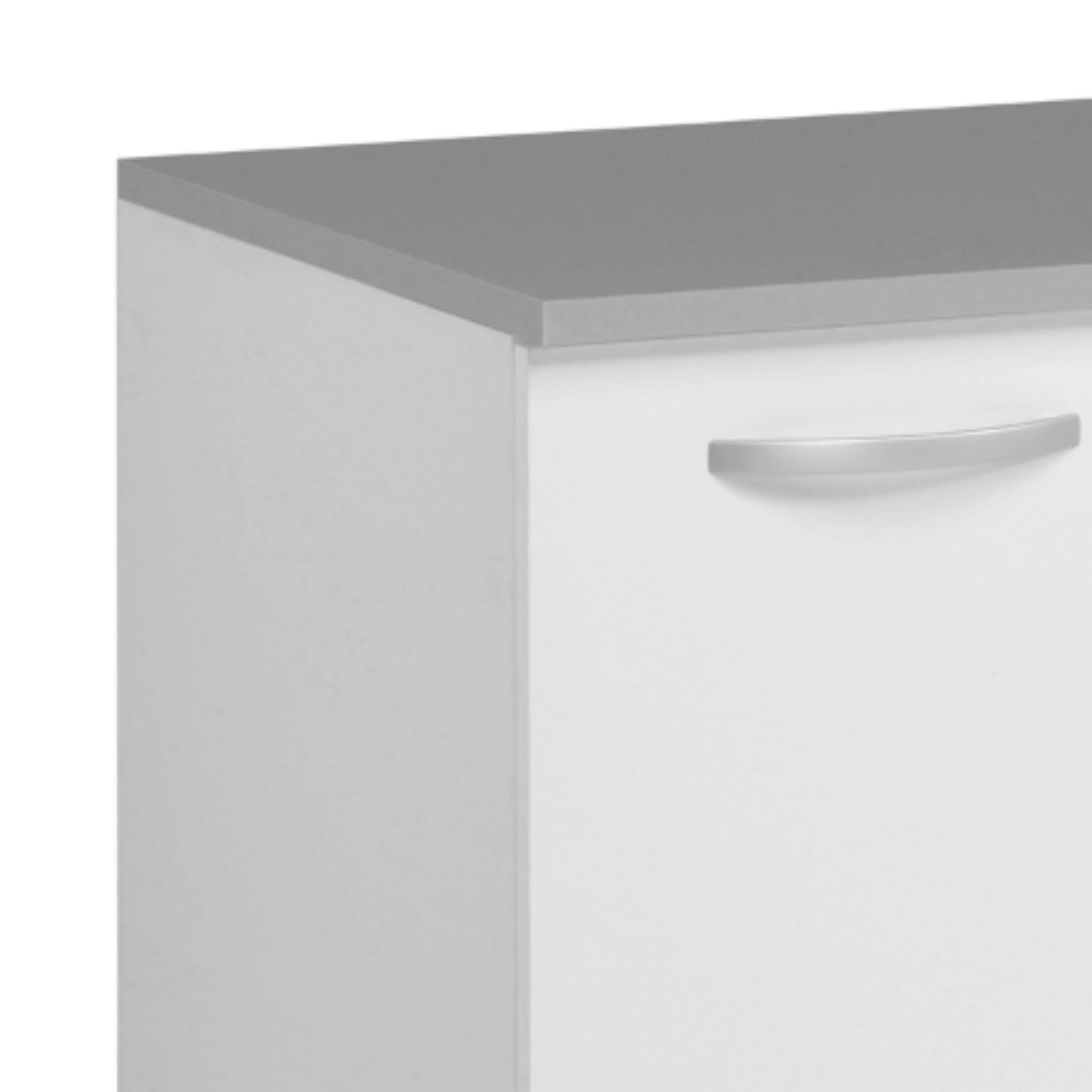 Un cajón blanco con un tirador plateado y una superficie superior gris.