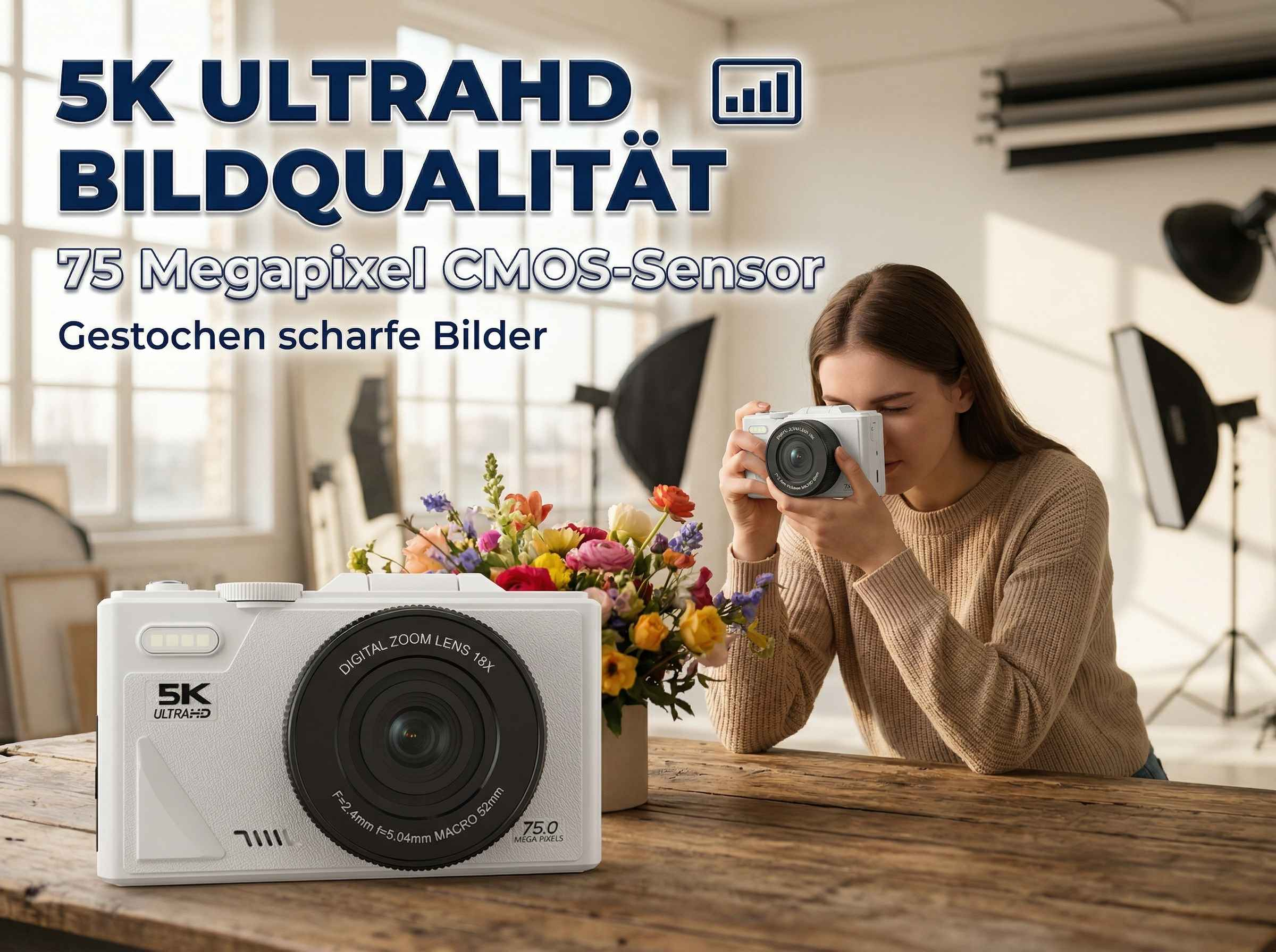 Eine Frau hält eine weiße Kamera vor ihr Gesicht. Blumen stehen daneben.