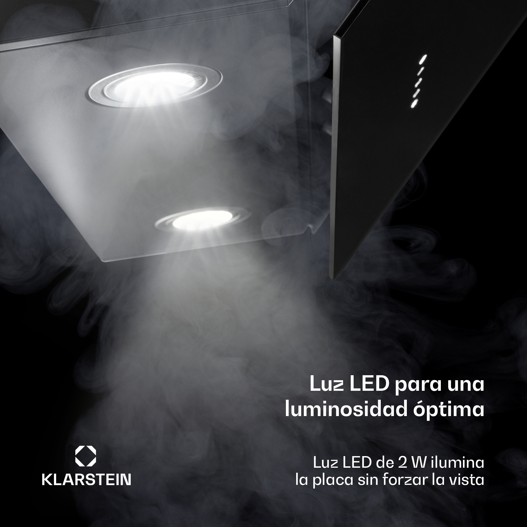 Cappa aspirante con luci LED e fumo nel buio.