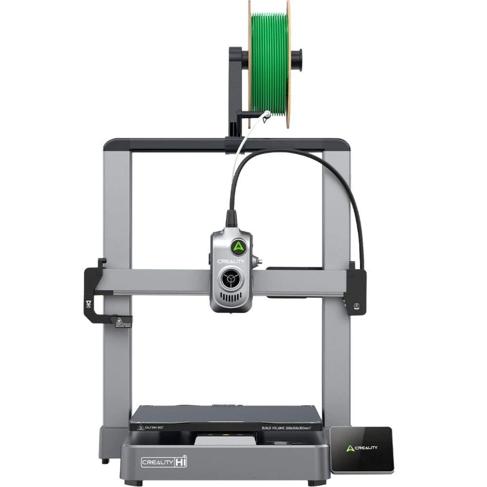 Una stampante 3D con filamento verde e corpo argentato.