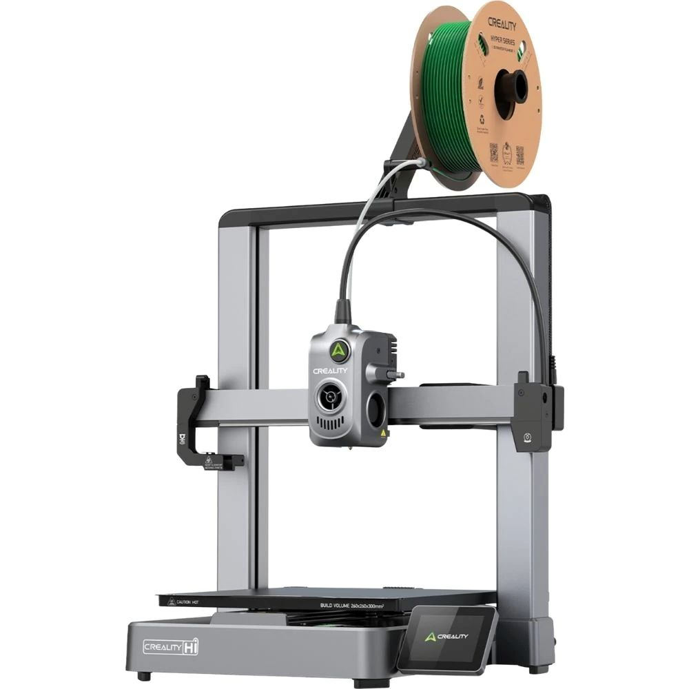 Una stampante 3D argentata con bobina verde e touchscreen.