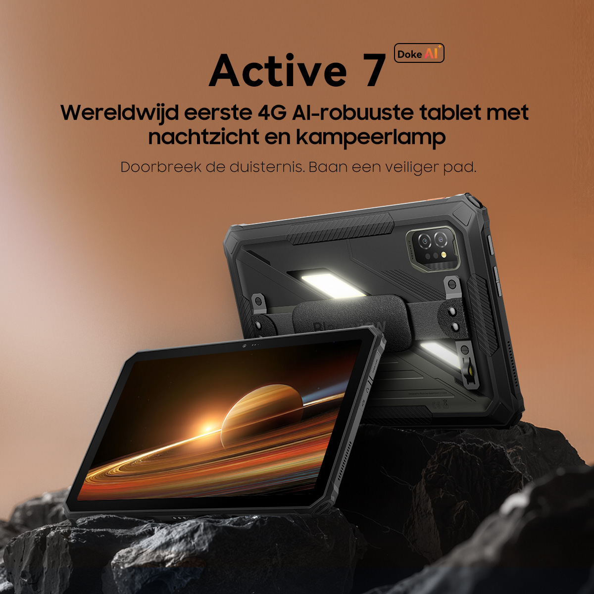 A rugged tablet with night vision and lamp, resting on rocks.