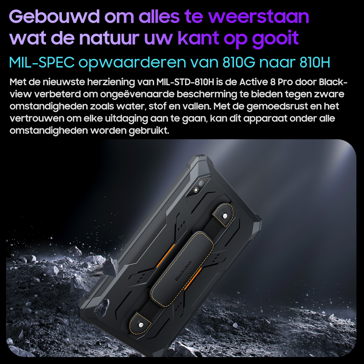 Zwarte robuuste tablet met handvat rust op rotsen, toont duurzaamheid.