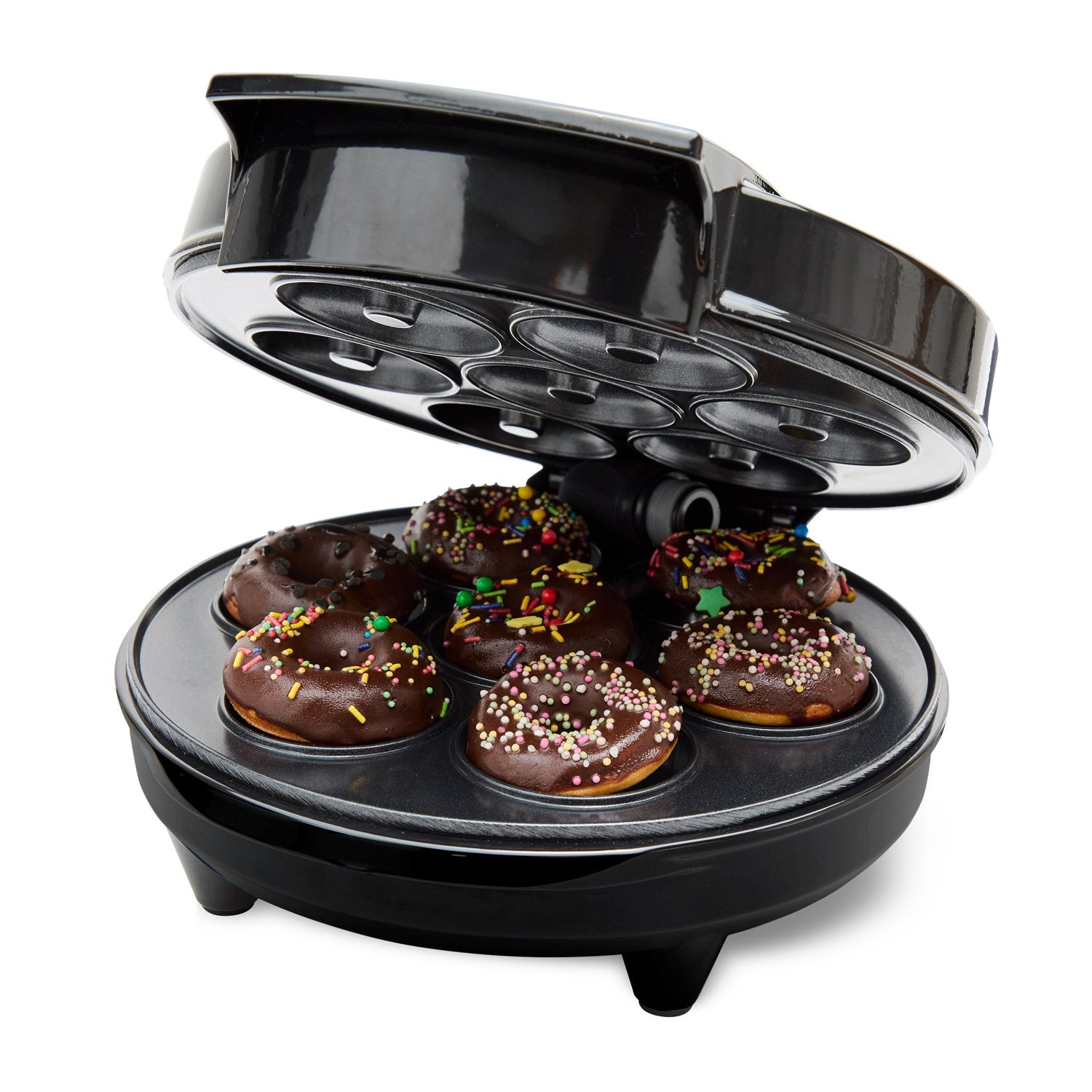A black donut maker with seven chocolate donuts covered in sprinkles.