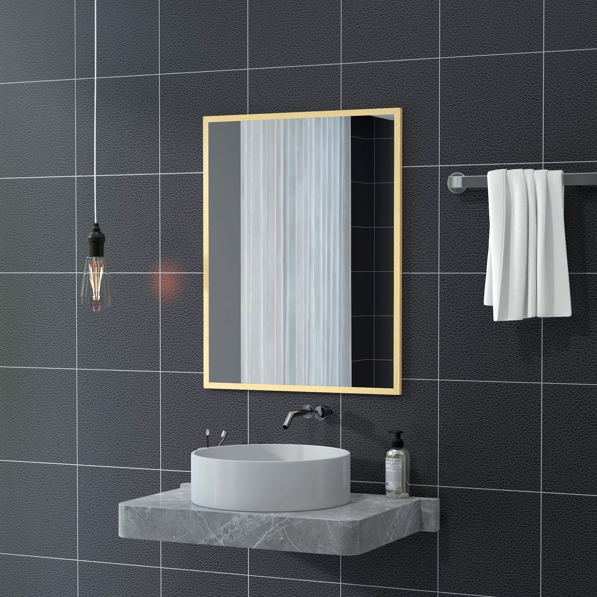 Baño con azulejo negro, lavabo, espejo y toalla.