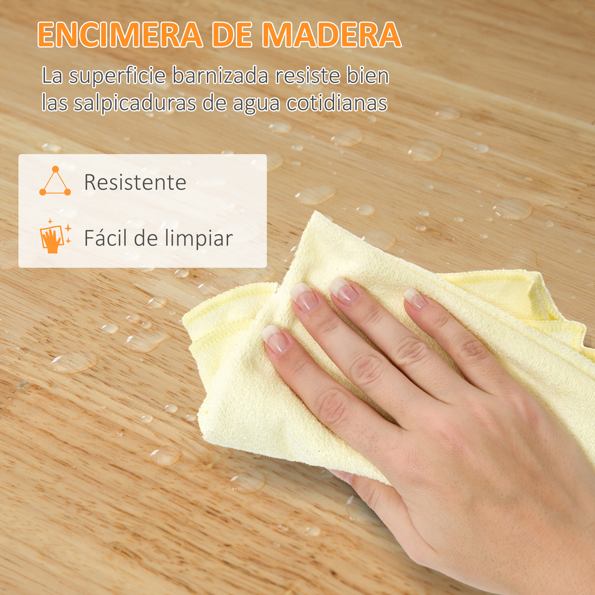 Encimera de madera con gotas de agua, una mano la limpia con un paño amarillo.