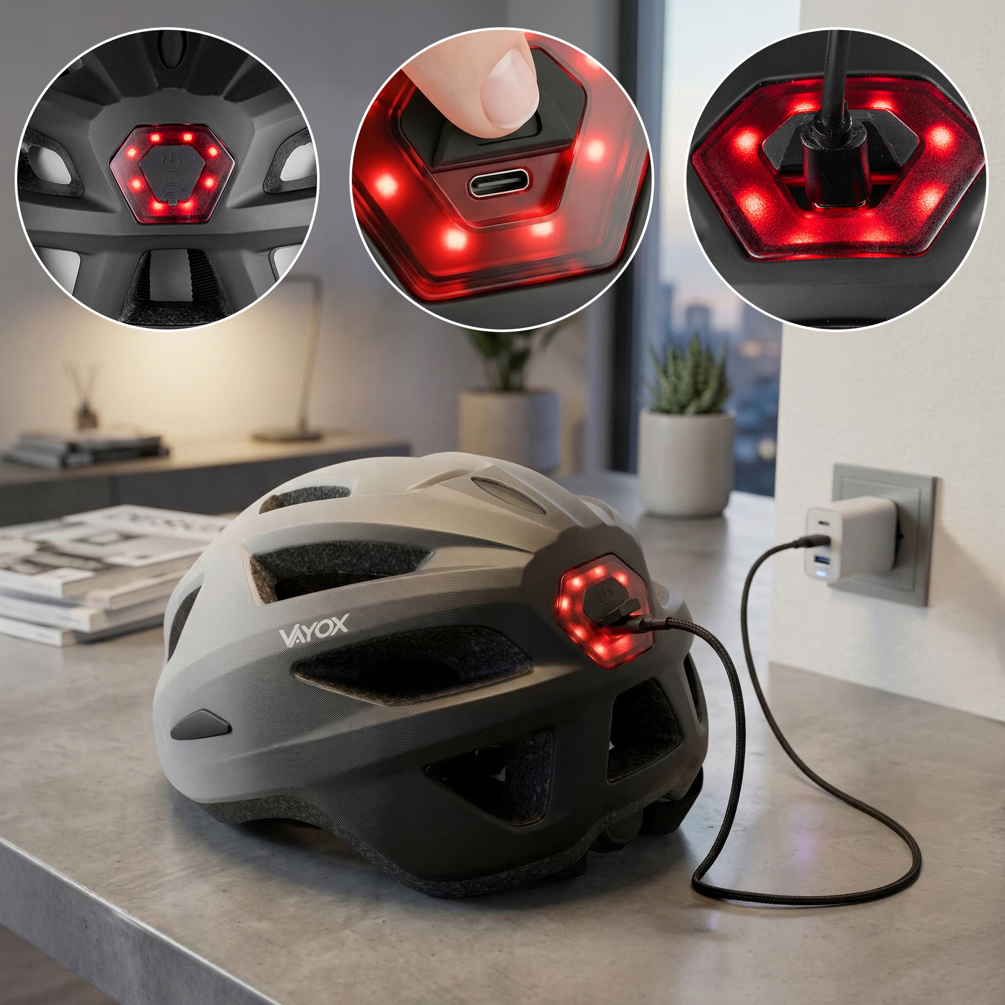 Szary kask z czerwonym światłem tylnym ładowanym przez adapter ścienny.
