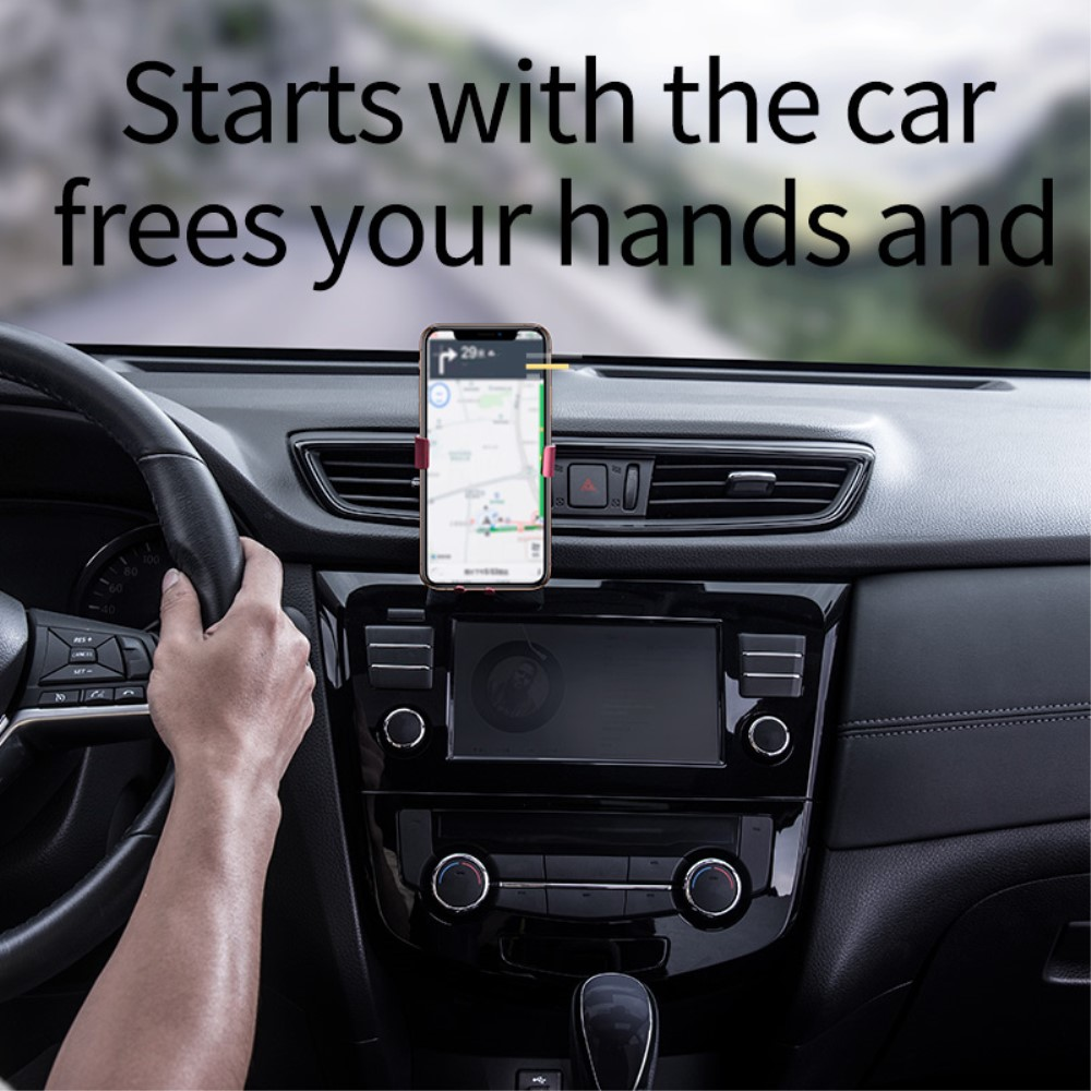 Deska rozdzielcza samochodu z uchwytem na telefon wyświetlającym nawigację GPS.