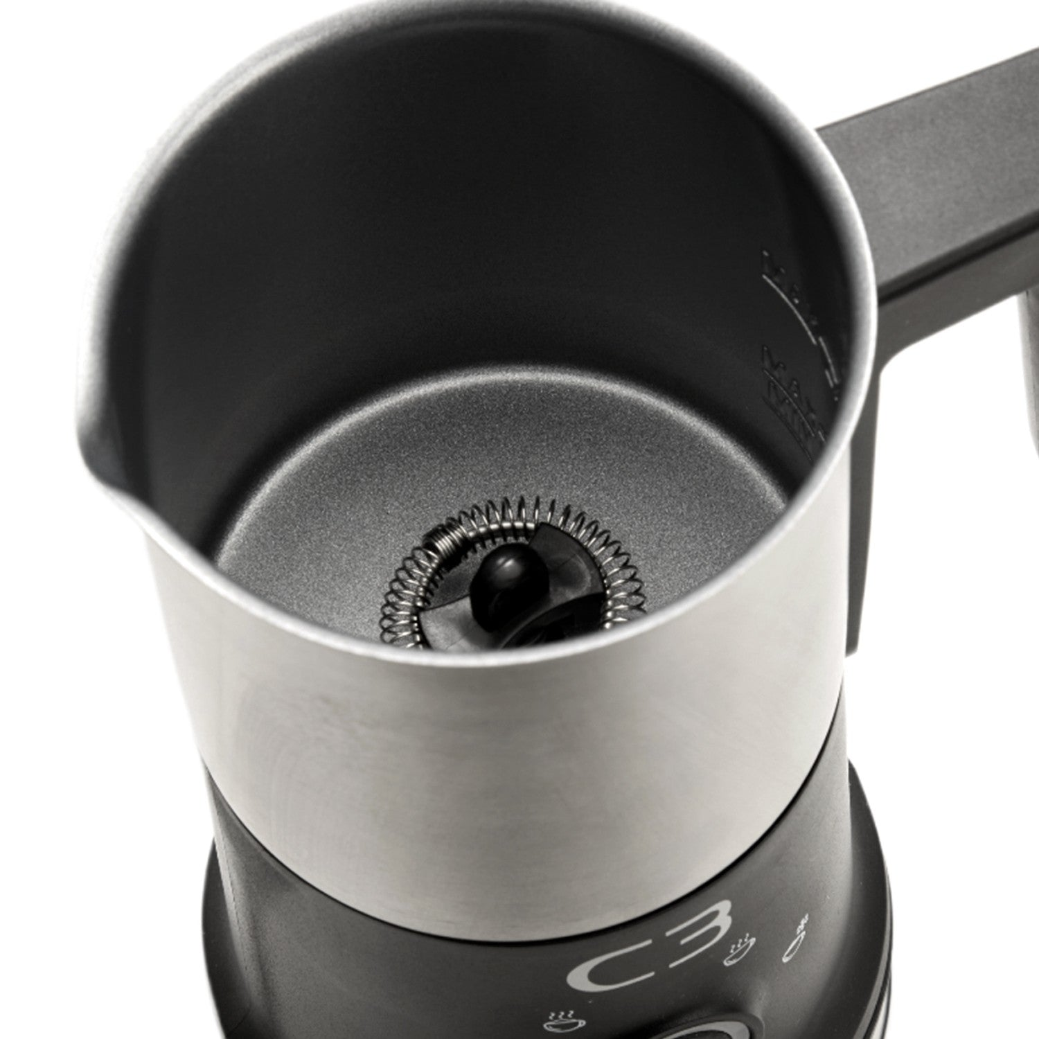 Close-up of a milk frother with a stainless steel body and black handle.