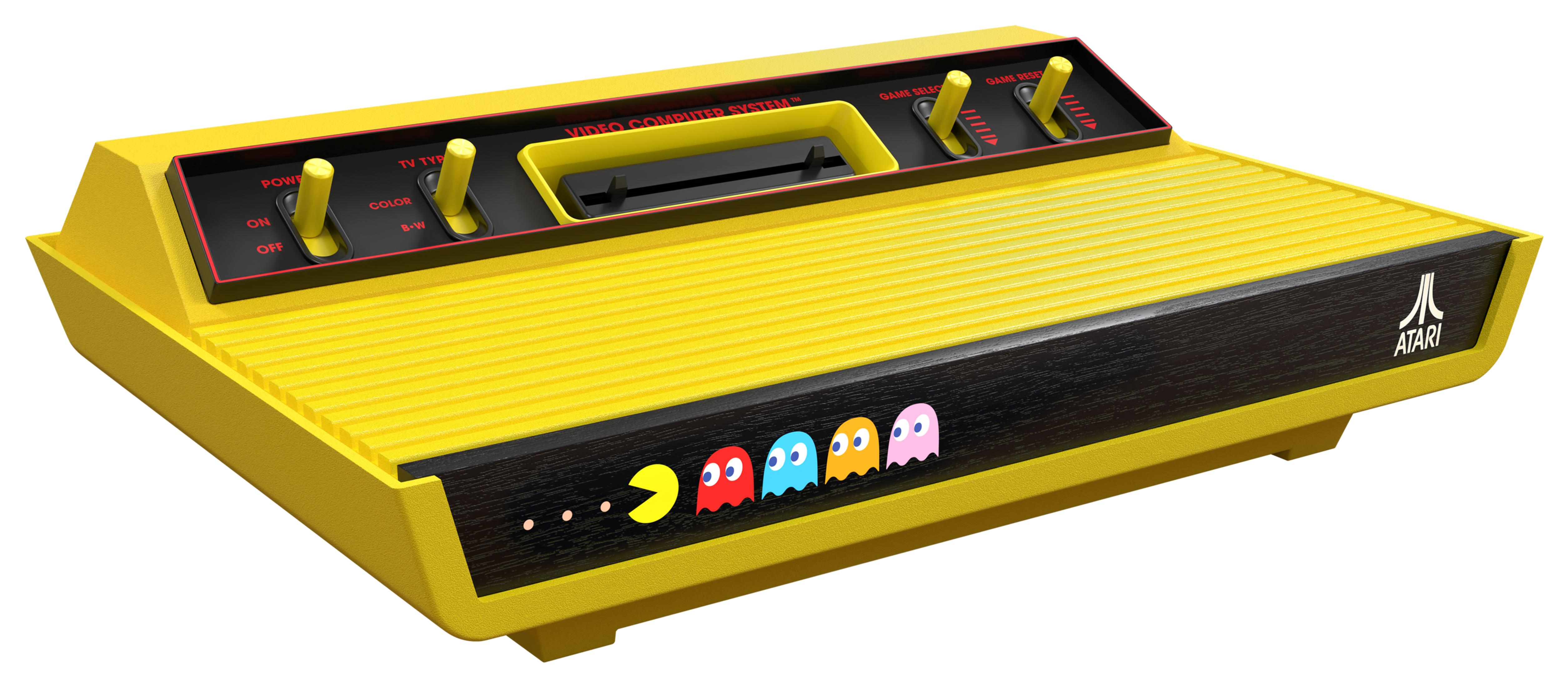 Carcasa amarilla de consola Atari con gráficos de Pac-Man y fantasmas.