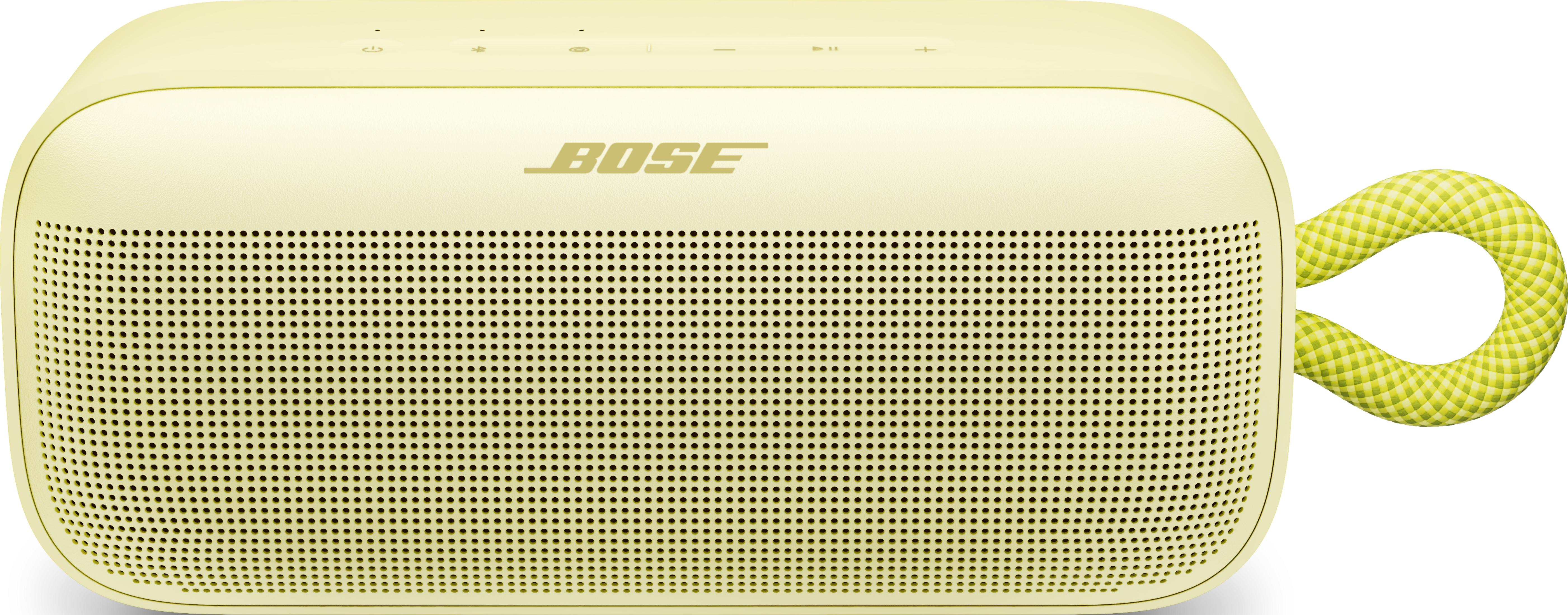 Eine gelbe Bose SoundLink Flex portable Lautsprecher mit einem karierten Tragegriff.