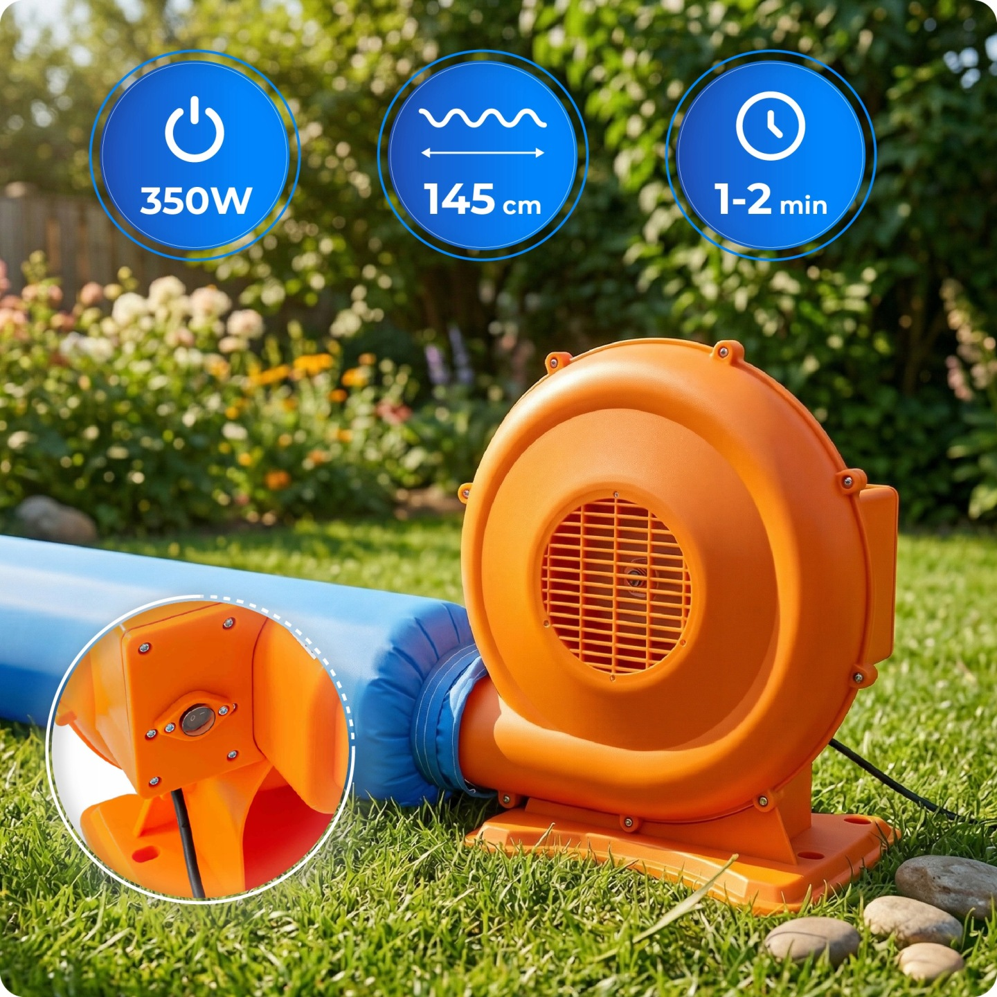 Ein orangefarbener Gebläse mit 350W Leistung auf einem Rasen.