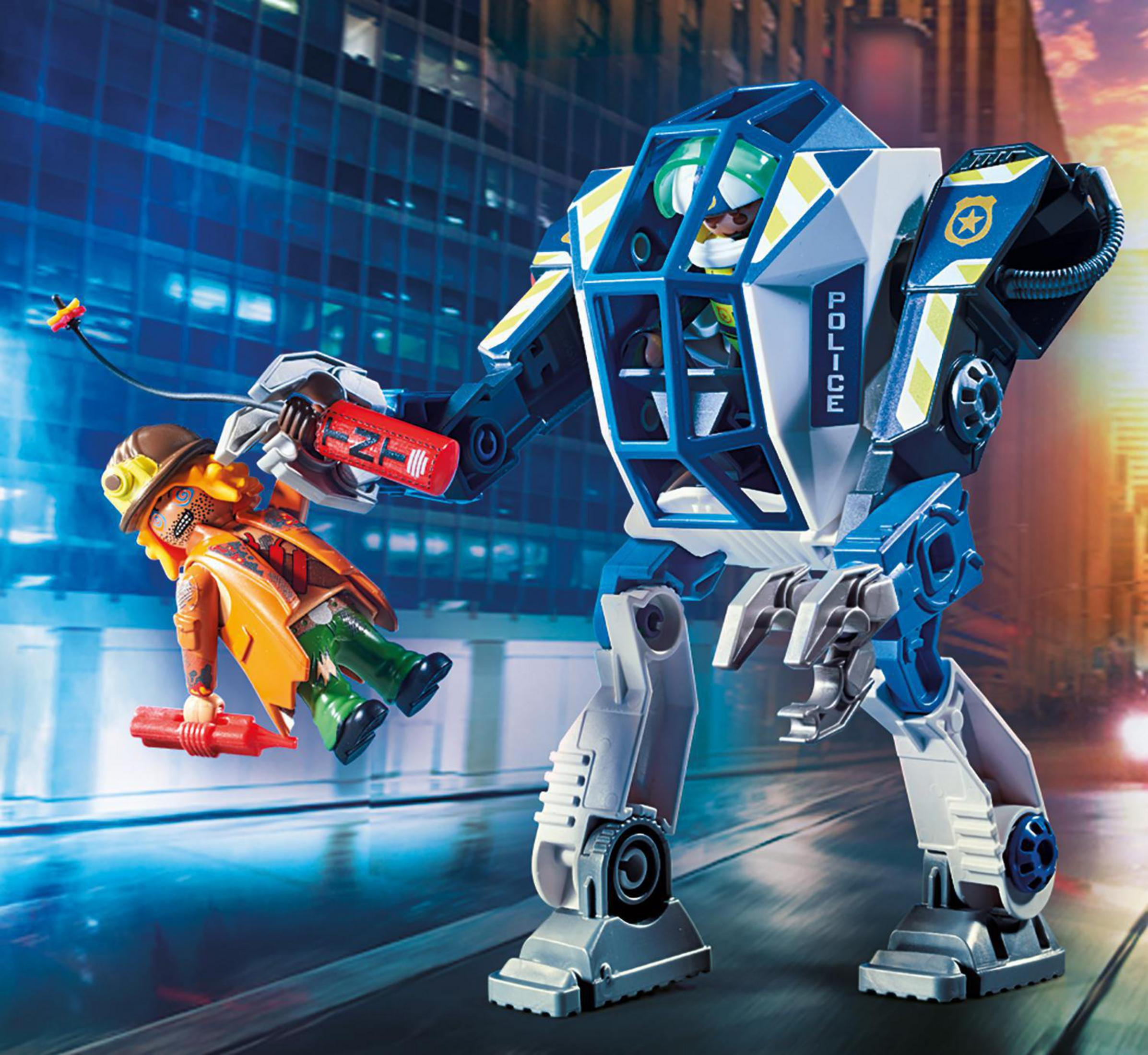 Policyjny egzoszkielet chwyta złoczyńcę czerwonym chwytakiem, przed panoramą miasta.