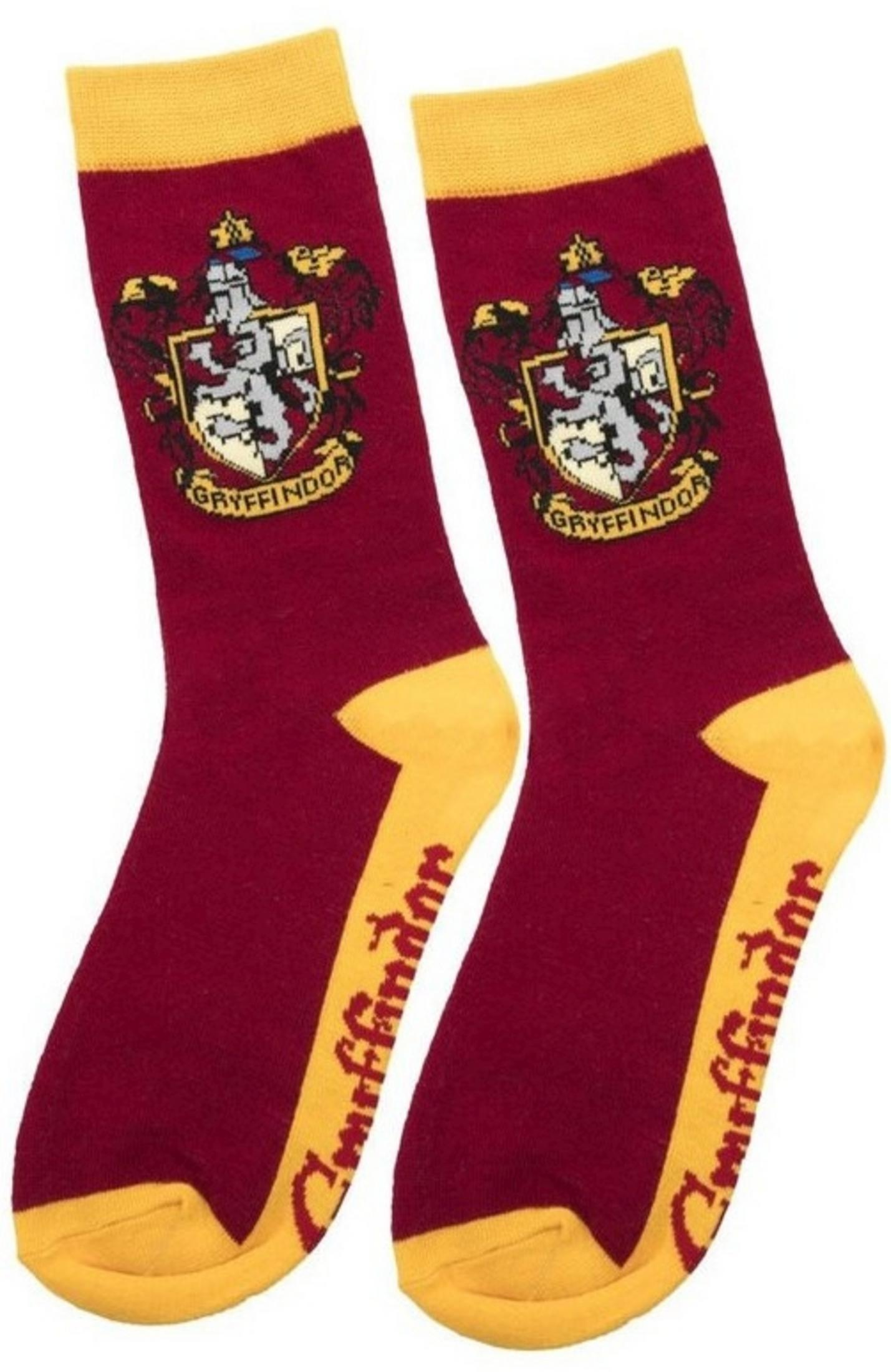 Rot-gelbe Socken mit Gryffindor-Wappen und Schriftzug.