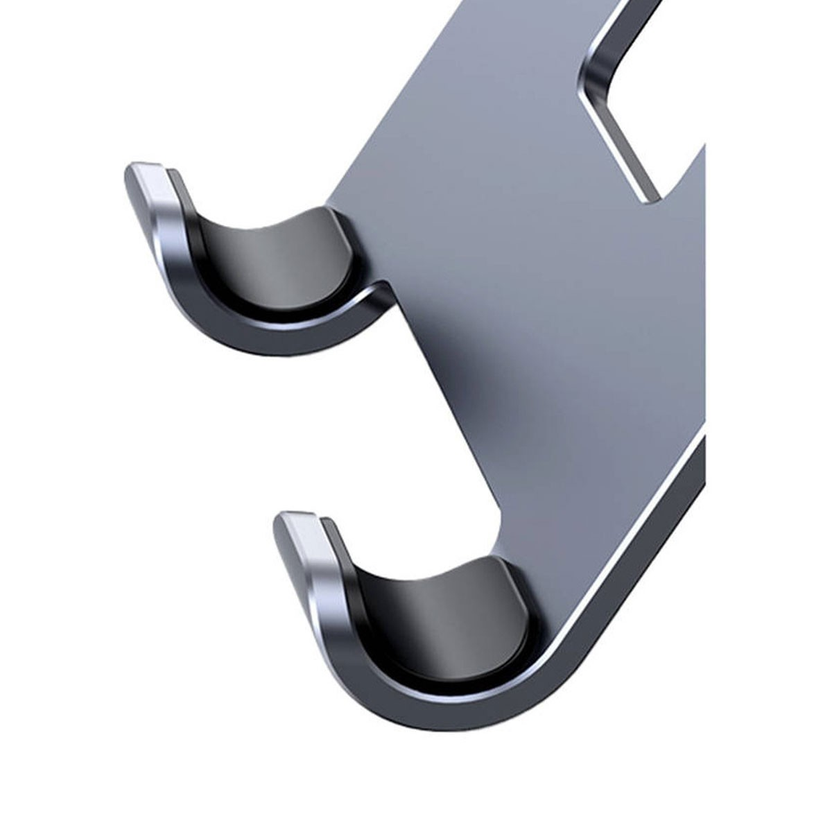 Zbliżenie szarego stojaka z czarnymi gumowymi podkładkami na ramionach.