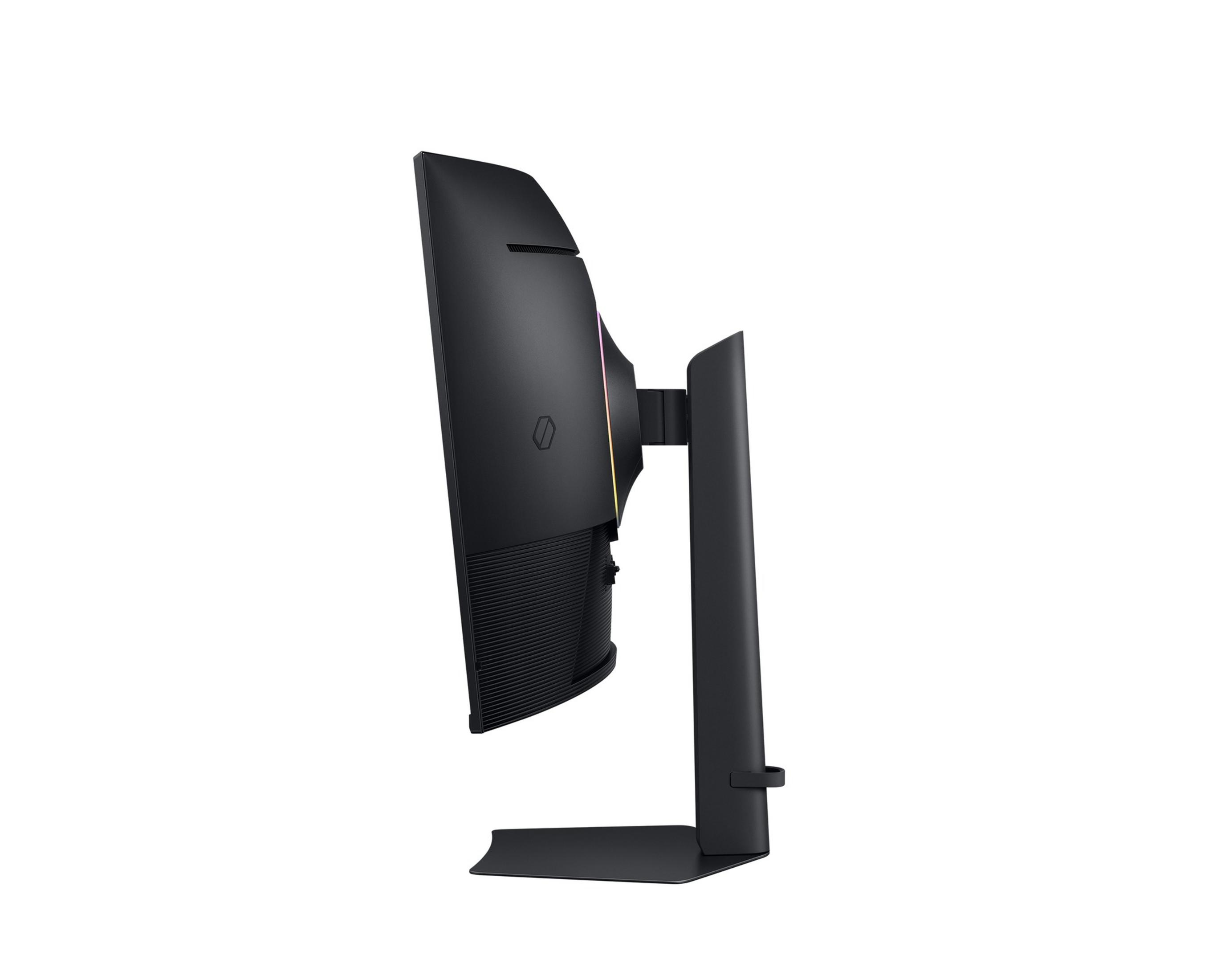 Black monitor with curved screen and RGB lighting, viewed from the side.