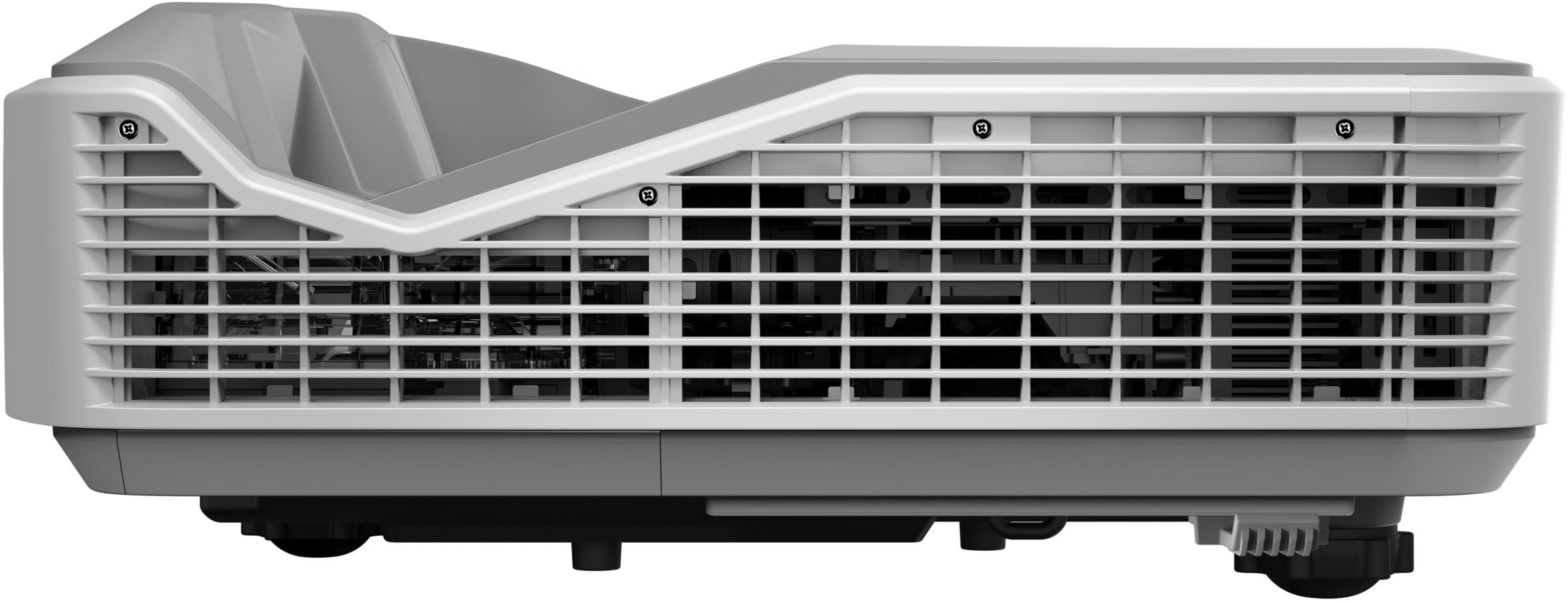 Szary projektor z otworami wentylacyjnymi i widocznymi elementami wewnętrznymi.