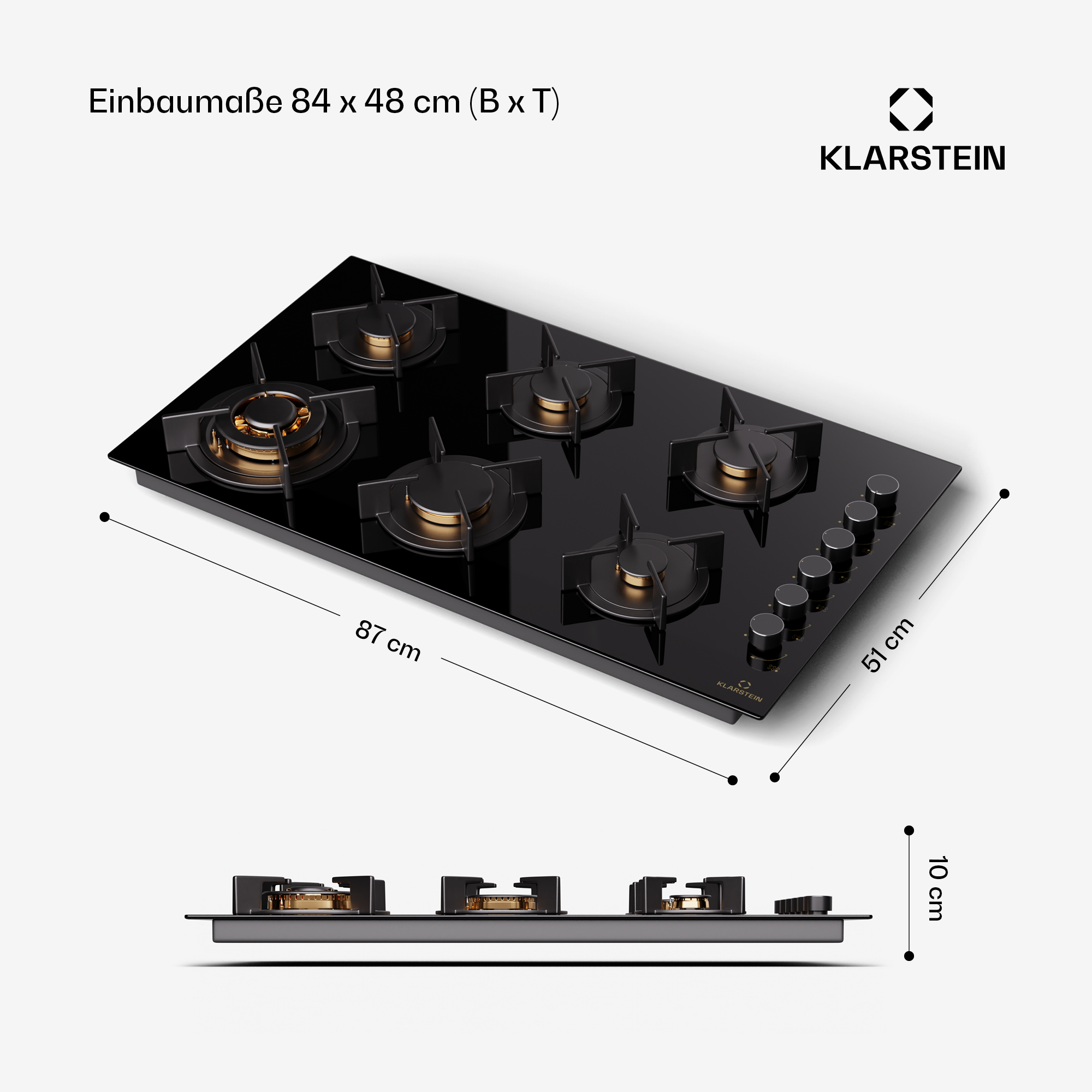 Ein schwarzes Gaskochfeld mit 5 Brennern und Metallbrennerkappen.