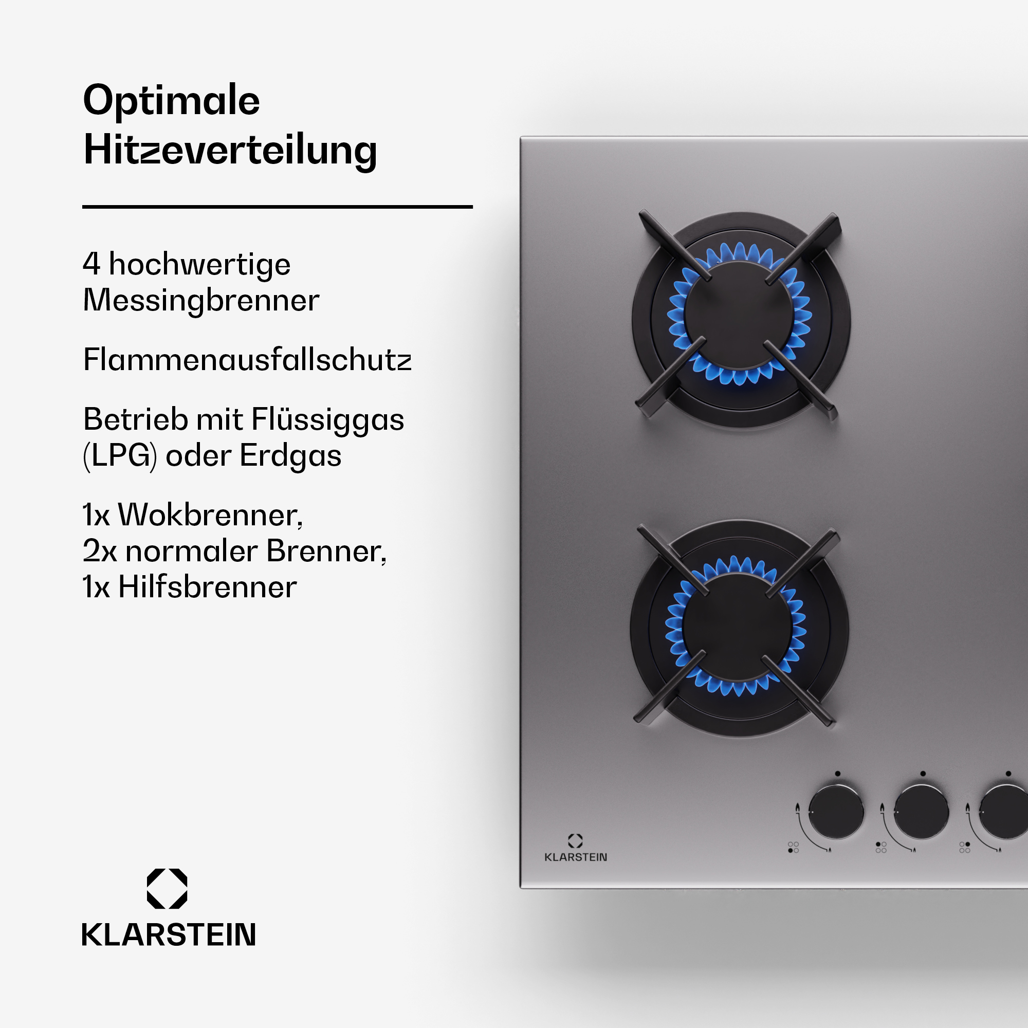 Ein silberner Gasherd mit zwei brennenden blauen Flammen und Bedienelementen.