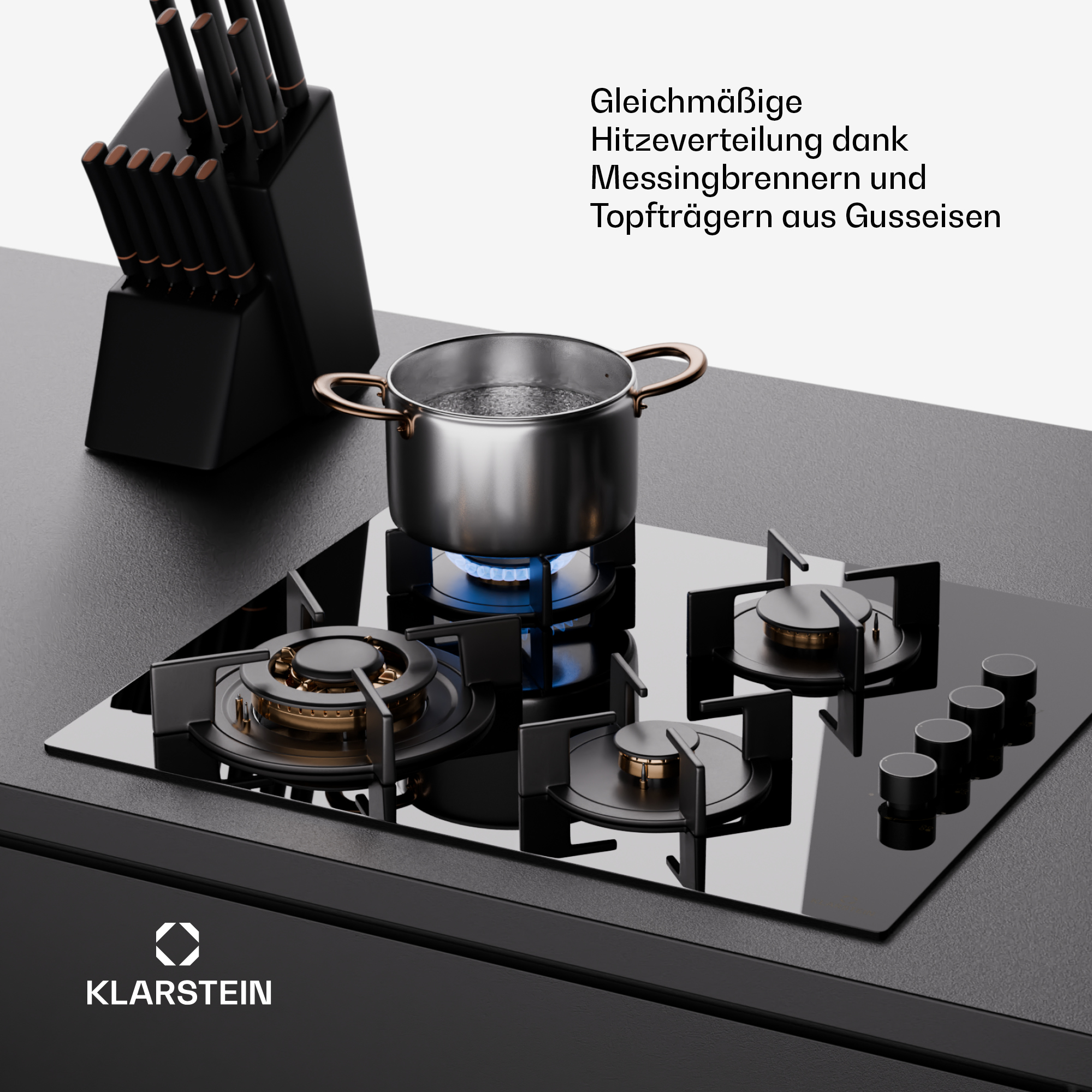 Moderner schwarzer Gaskochfeld mit Töpfen und Messerblock.