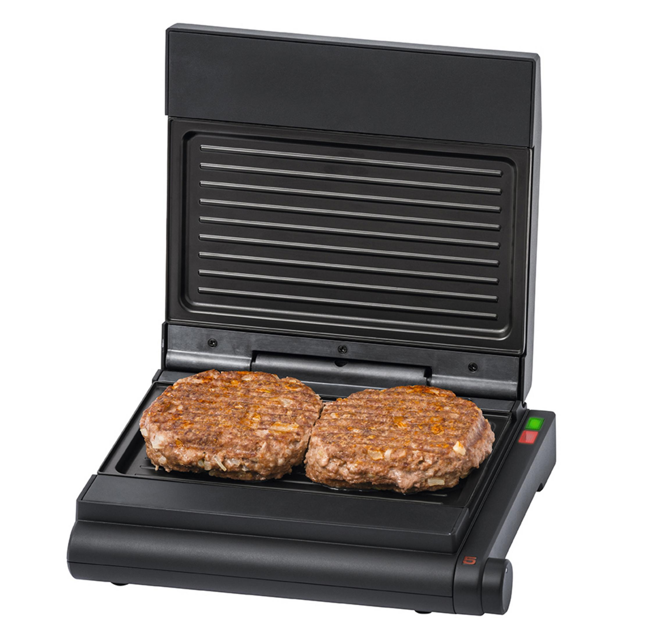 Zwei Burger-Patties auf einem offenen, schwarzen Kontaktgrill.