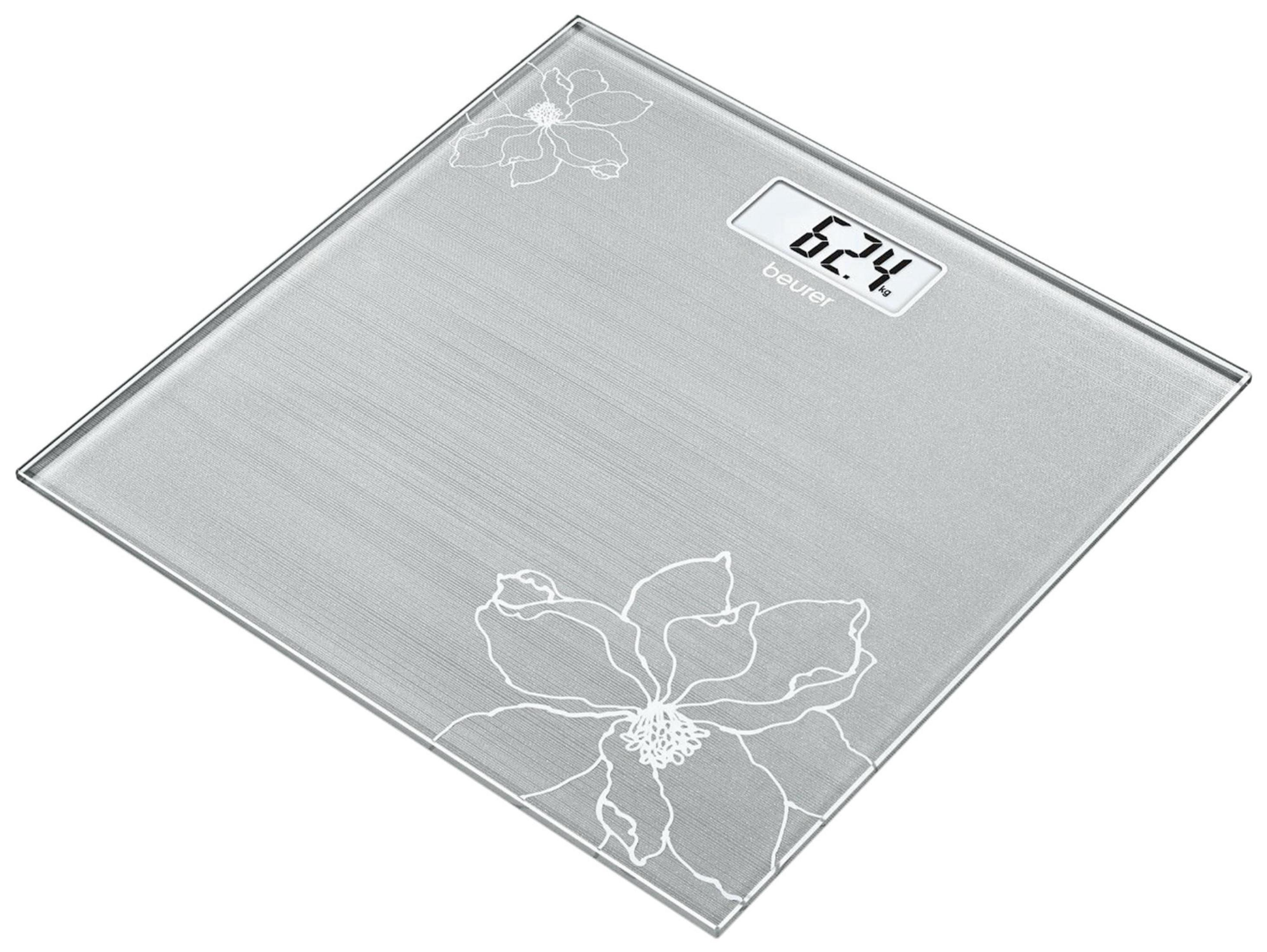 Graue Personenwaage mit Blumenmuster und digitaler Anzeige von 62,4 kg.