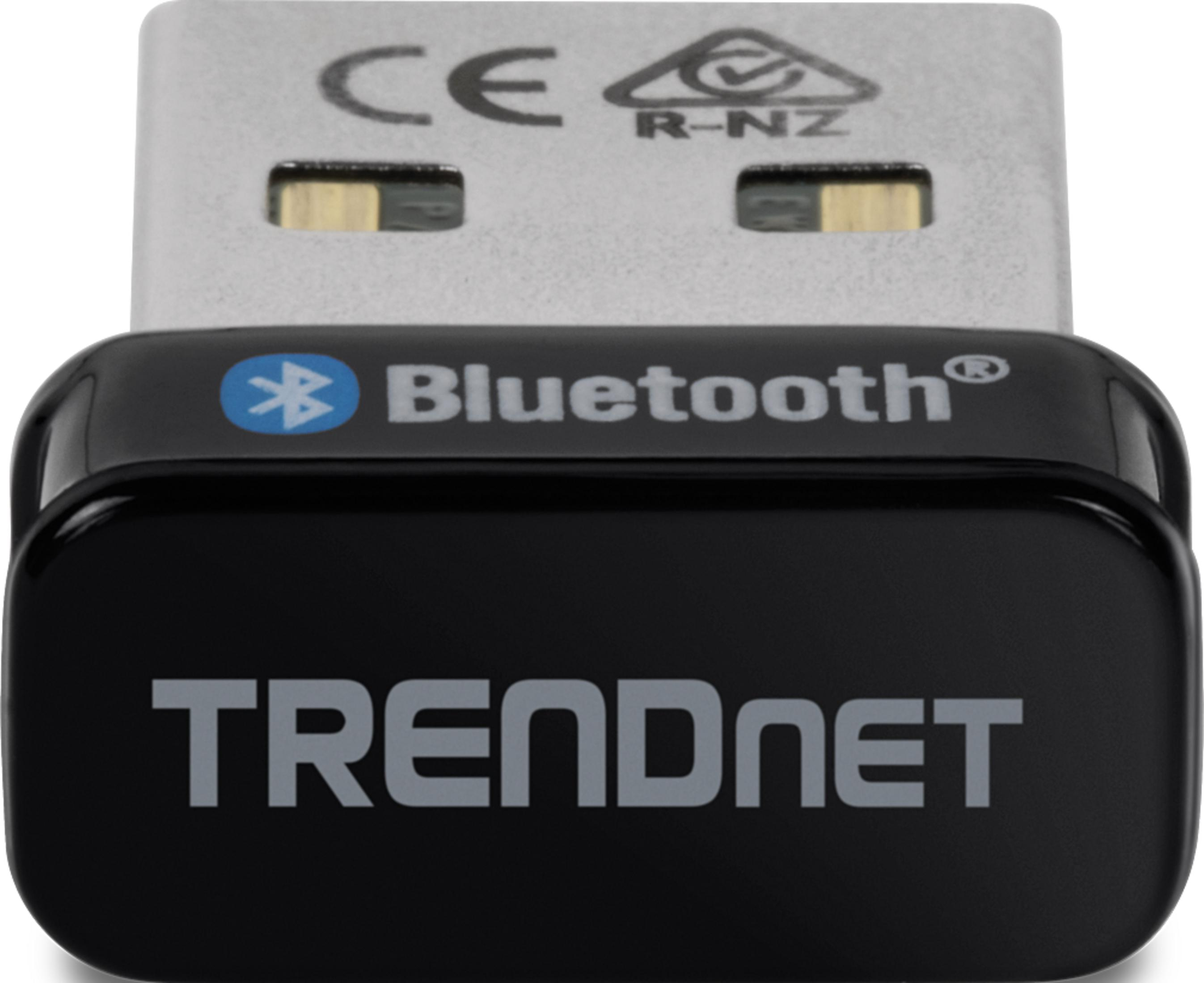 Un adaptateur Bluetooth noir avec connecteur USB argenté et marquage CE.