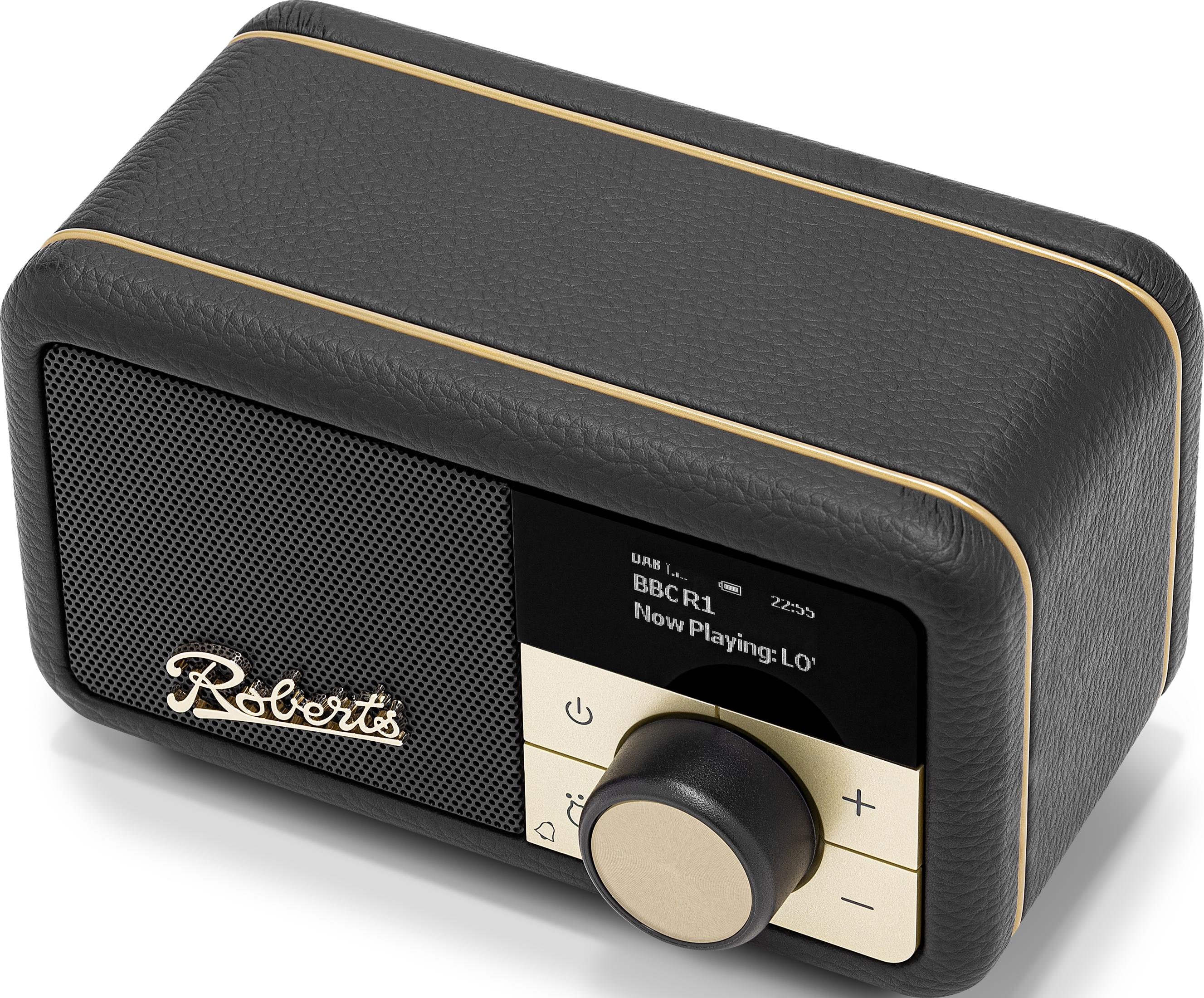 Una radio retrò nera con finiture dorate e manopola dorata.