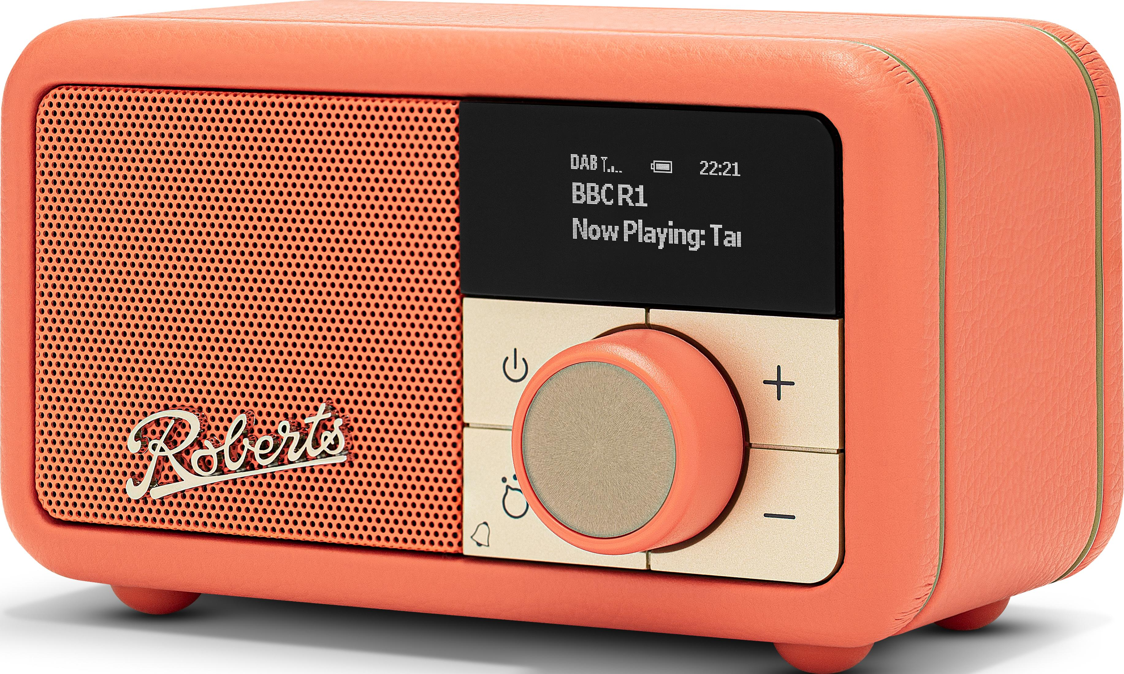 Una radio DAB color corallo con griglia dell'altoparlante e display digitale.