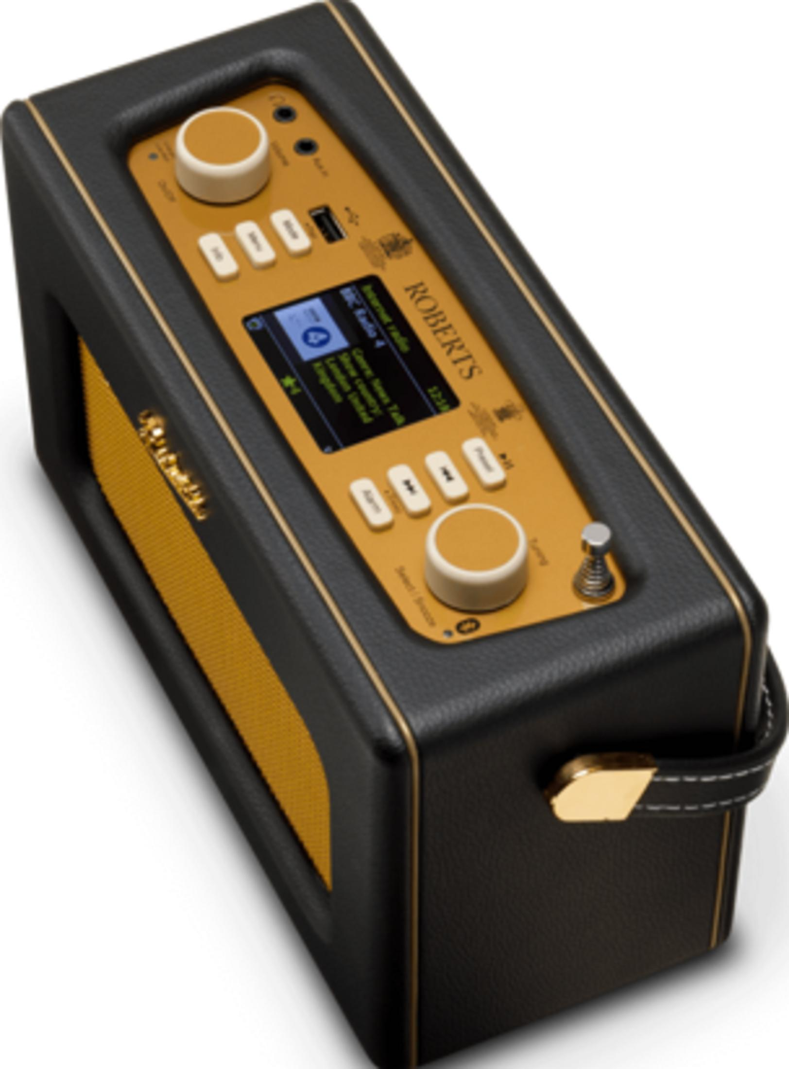 Czarno-złote radio internetowe Roberts z głośnikiem i panelem sterowania.