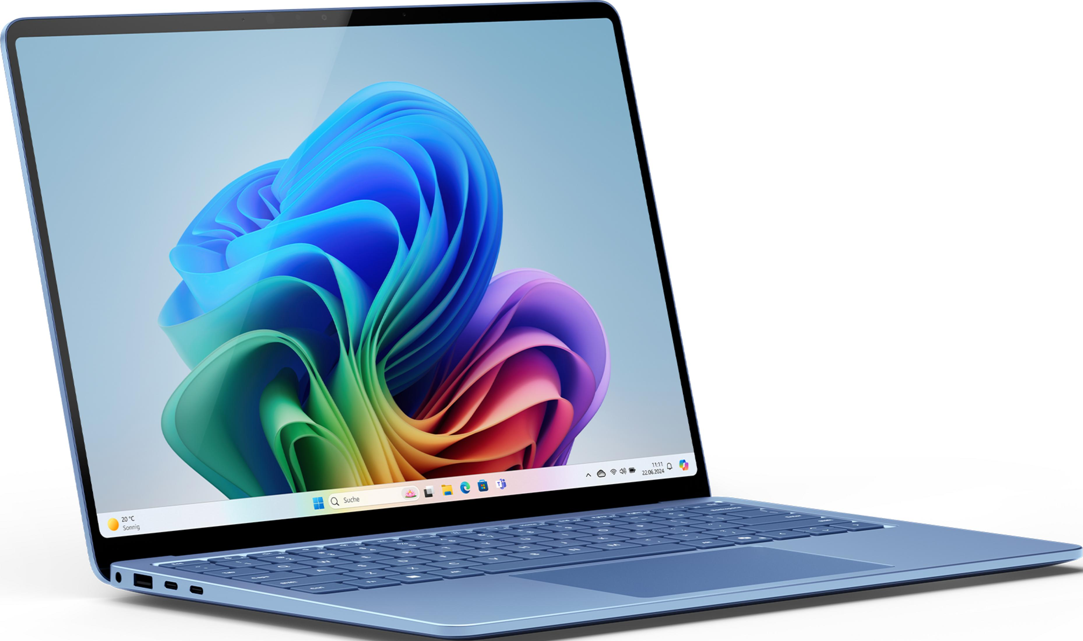 Blaues Laptop mit farbigem Hintergrundbild und Tastatur.